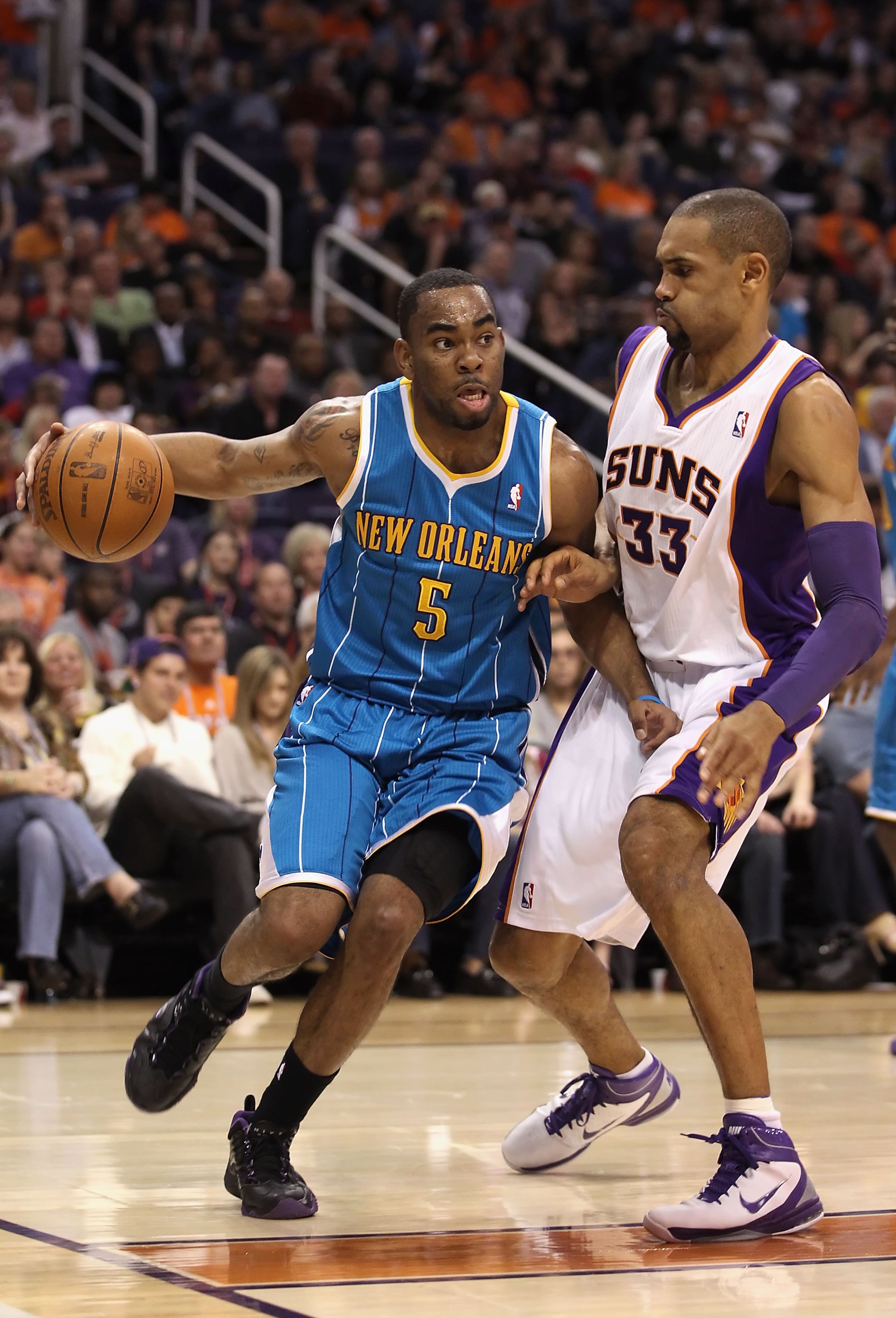 PHOENIX, AZ - JANUARY 30: Marcus Thornton #5 of the New Orleans Hornets handles the ball during the NBA game against the Phoenix Suns at US Airways Center on January 30, 2011 in Phoenix, Arizona. The Suns defeated the Hornets 104-102. NOTE TO USER: Use PHOENIX, AZ - JANUARY 30: Marcus Thornton #5 of the New Orleans Hornets handles the ball during the NBA game against the Phoenix Suns at US Airways Center on January 30, 2011 in Phoenix, Arizona. The Suns defeated the Hornets 104-102. NOTE TO USER: Use