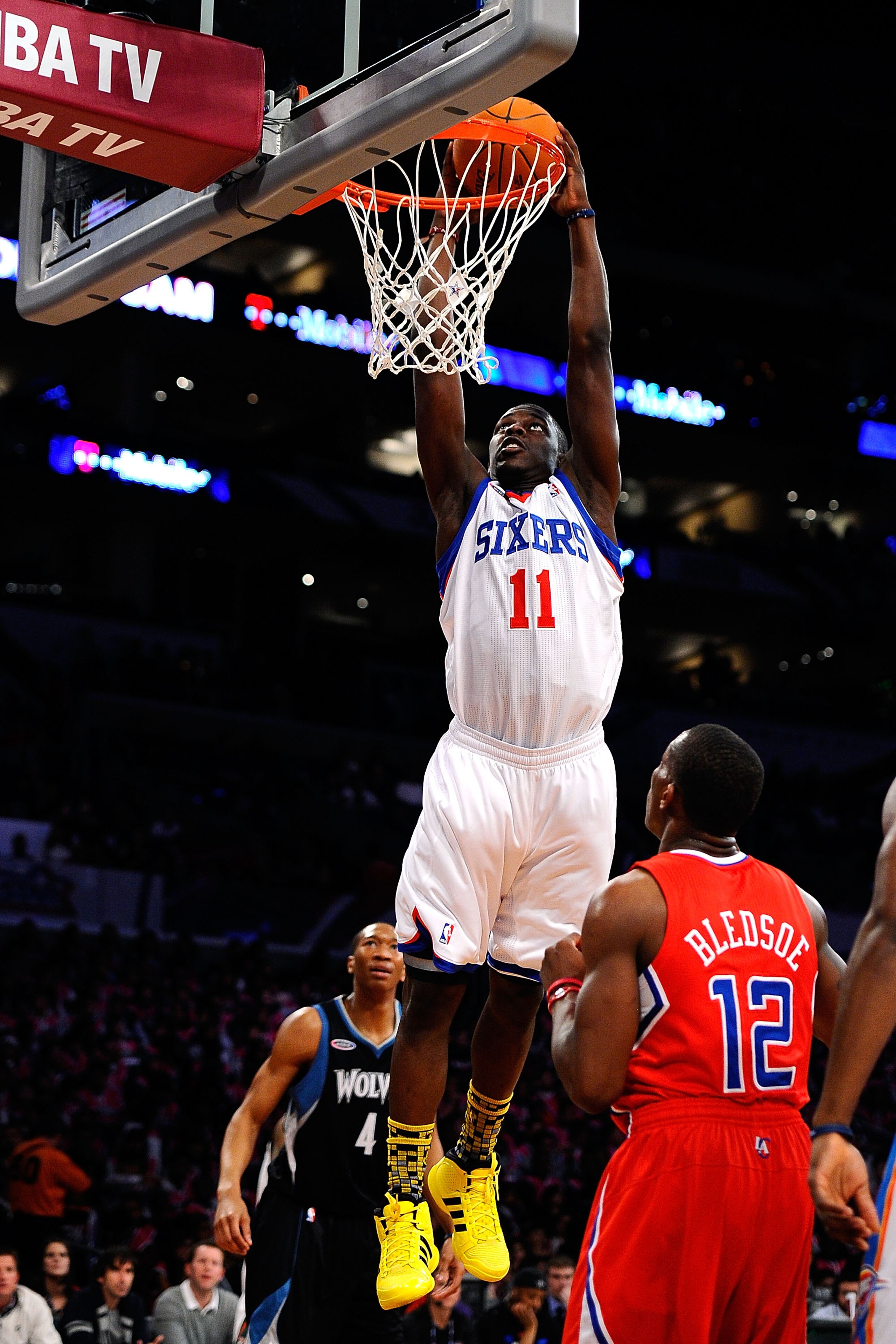 LOS ANGELES, CA - FEBRUARY 18:  Jrue Holiday #11 of the Philadelphia 76ers and the Sophomore Team dunks the ball in the first half against the Rookie Team during the T-Mobile Rookie Challenge and Youth Jam at Staples Center on February 18, 2011 in Los Ang
