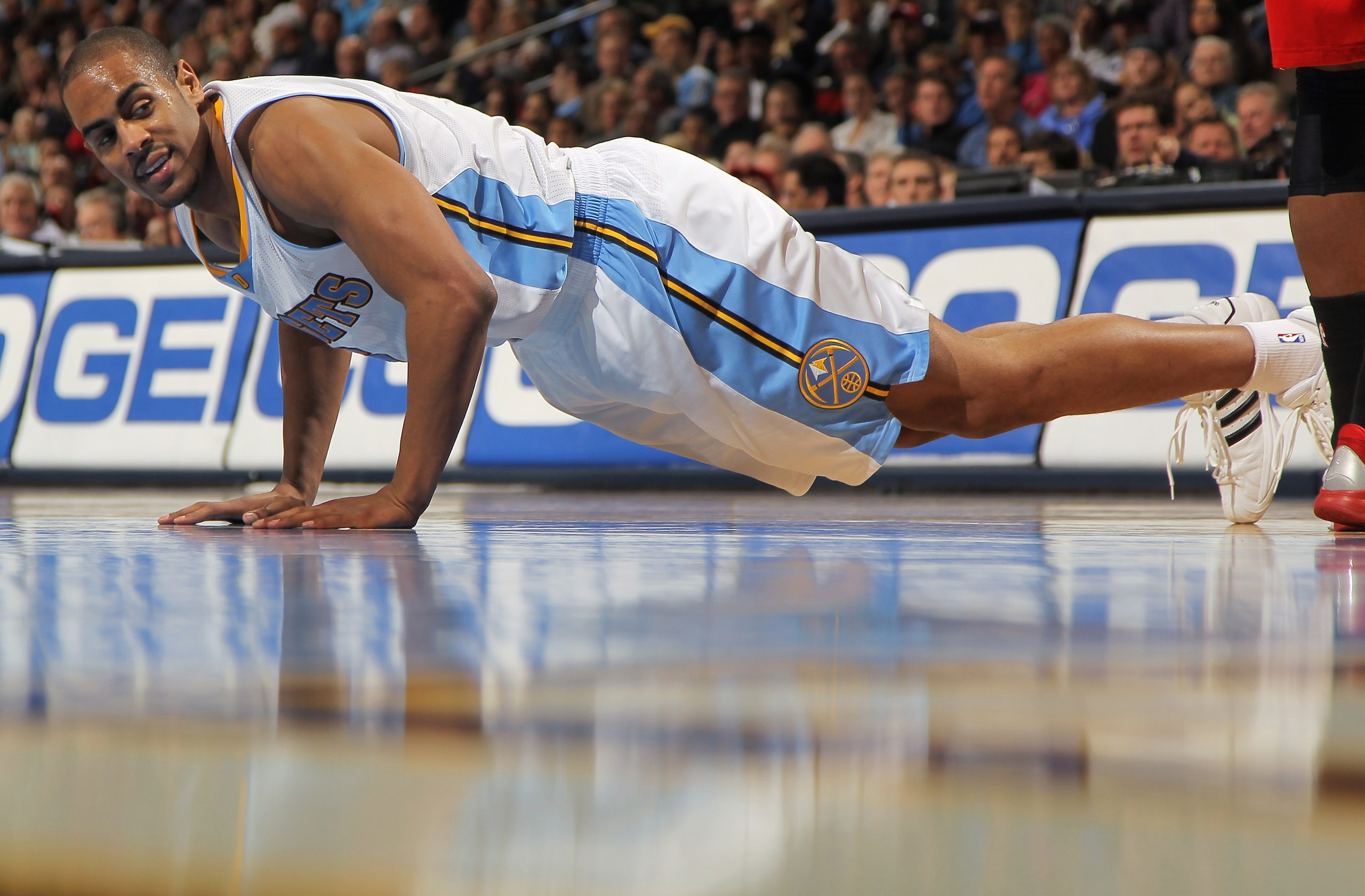 DENVER - DECEMBER 28:  Arron Afflalo #6 of the Denver Nuggets picks himself up off the court after a play against the Portland Trail Blazers at Pepsi Center on December 28, 2010 in Denver, Colorado. The Nuggets defeated the Blazers 95-77. NOTE TO USER: Us