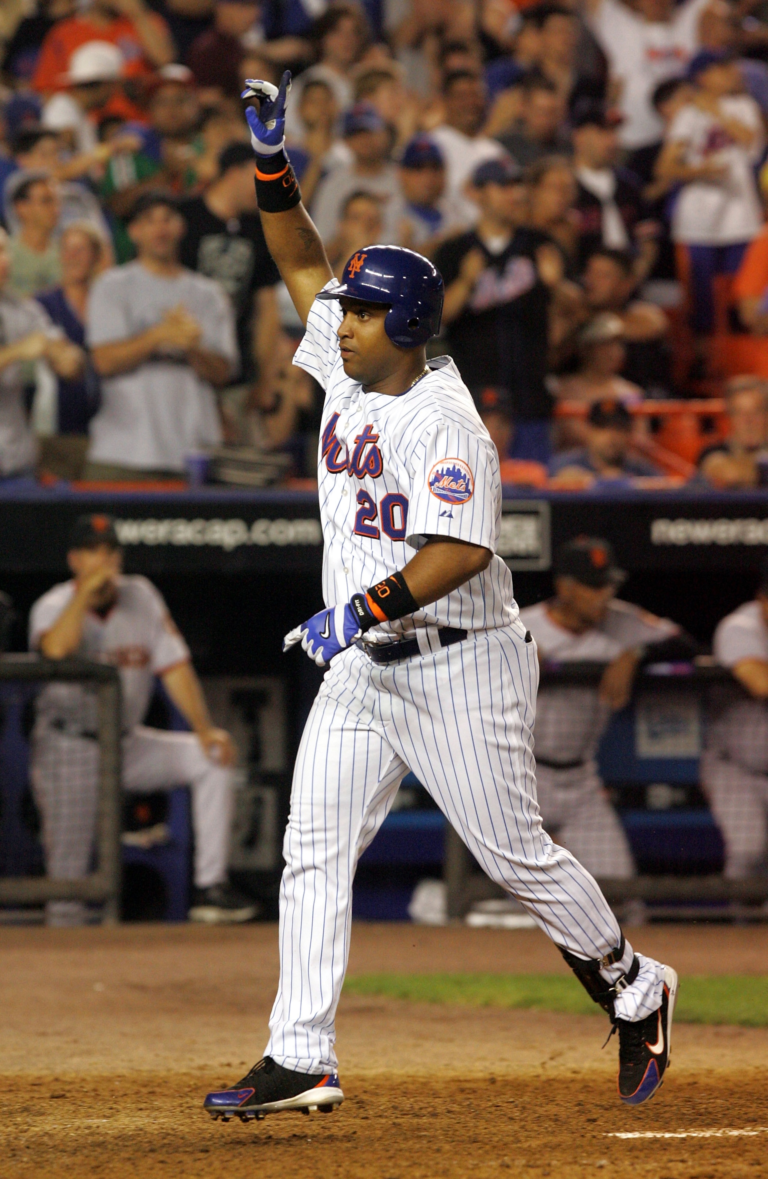 FLUSHING, NY - JUNE 5: Victor Diaz #20 of the New York Mets heads for home plate after hitting his two-run home run in the fifth inning against the San Francisco Giants during the second game of their double header at Shea Stadium on June 5, 2005 in Flus FLUSHING, NY - JUNE 5: Victor Diaz #20 of the New York Mets heads for home plate after hitting his two-run home run in the fifth inning against the San Francisco Giants during the second game of their double header at Shea Stadium on June 5, 2005 in Flus