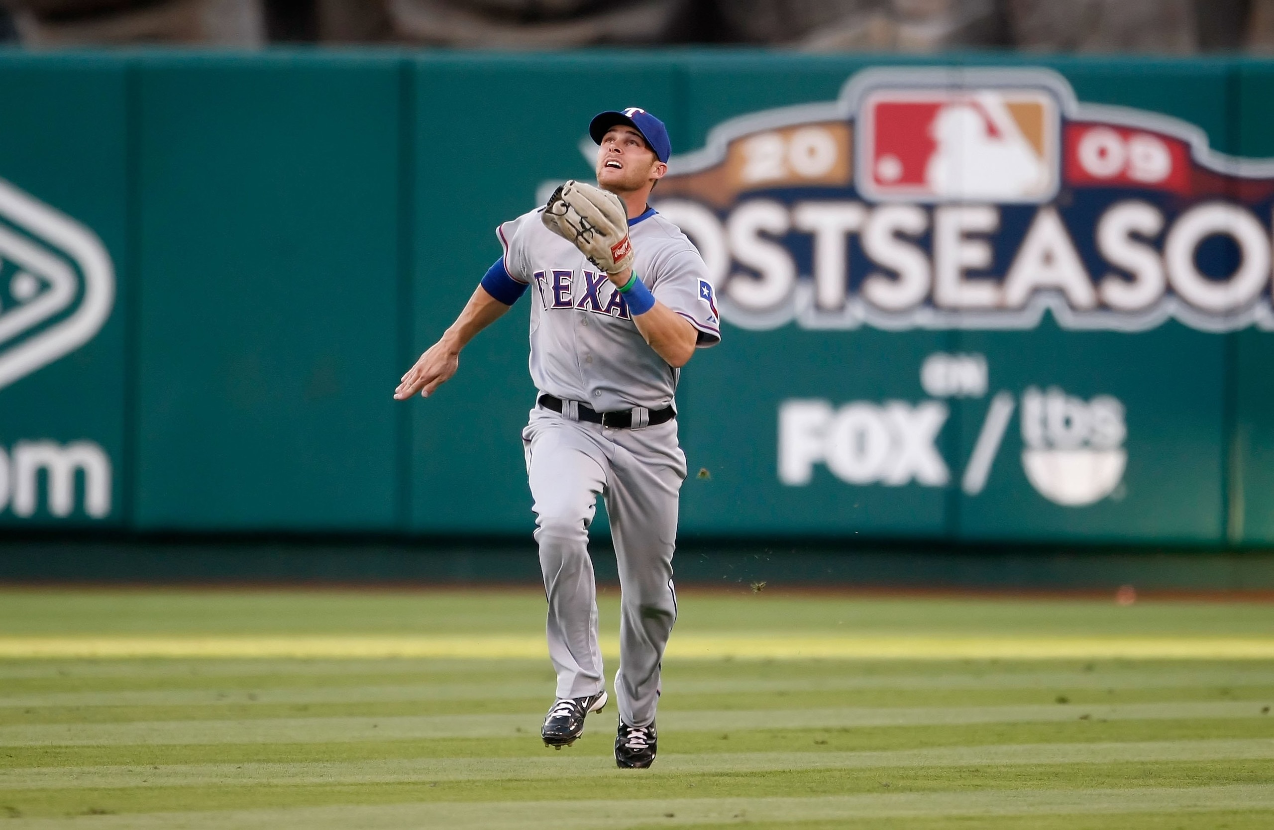 ANAHEIM, CA - OCTOBER 01: Craig Gentry #68 of the Texas Rangers chases down a fly ball against the Los Angeles Angels of Anaheim at Angel Stadium on October 1, 2009 in Anaheim, California. The Rangers defeated the Angels 11-3. (Photo by Jeff Gross/Getty ANAHEIM, CA - OCTOBER 01: Craig Gentry #68 of the Texas Rangers chases down a fly ball against the Los Angeles Angels of Anaheim at Angel Stadium on October 1, 2009 in Anaheim, California. The Rangers defeated the Angels 11-3. (Photo by Jeff Gross/Getty