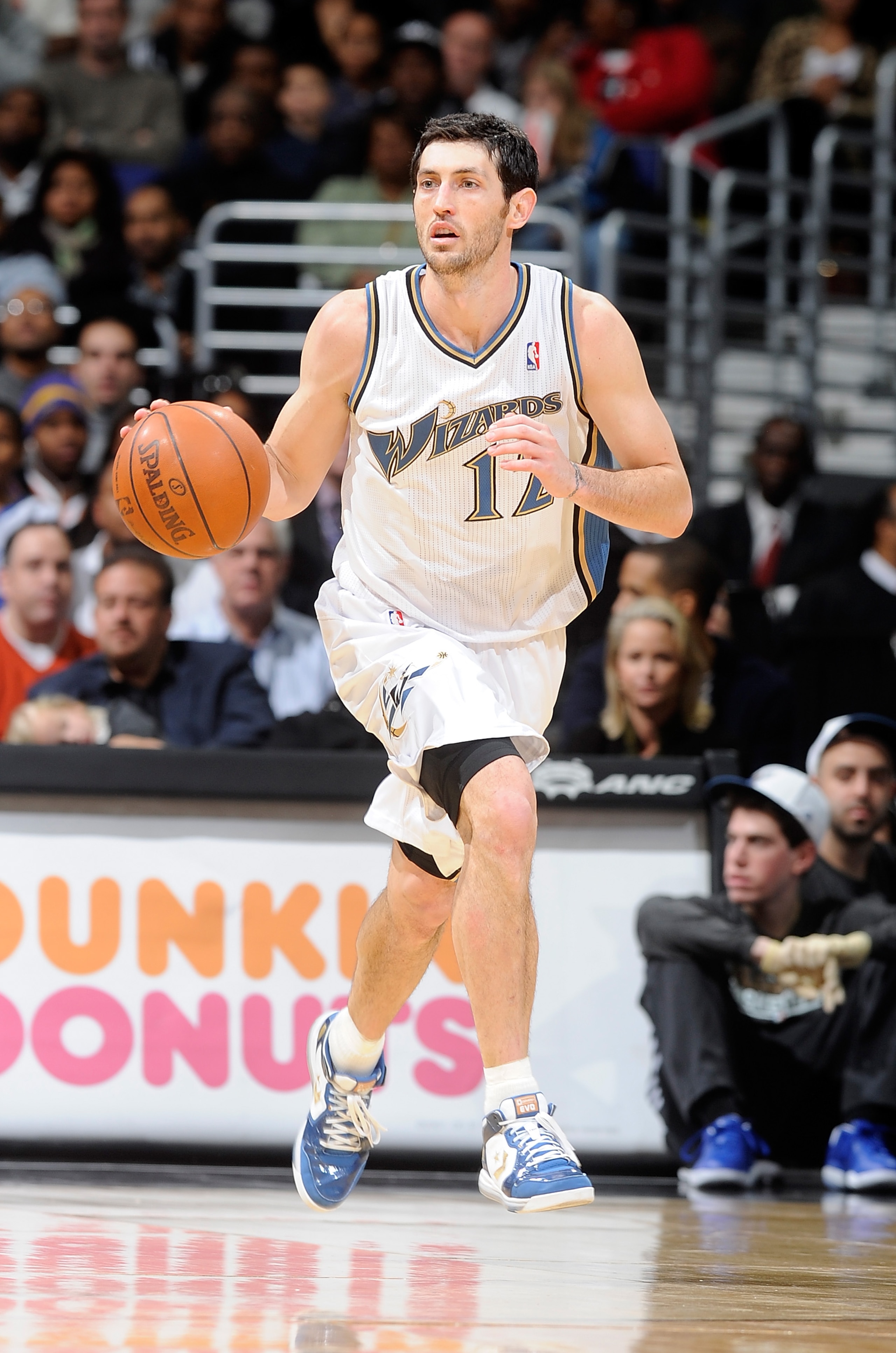 WASHINGTON, DC - DECEMBER 18:  Kirk Hinrich #12 of the Washington Wizards handles the ball against the Miami Heat at the Verizon Center on December 18, 2010 in Washington, DC. NOTE TO USER: User expressly acknowledges and agrees that, by downloading and o