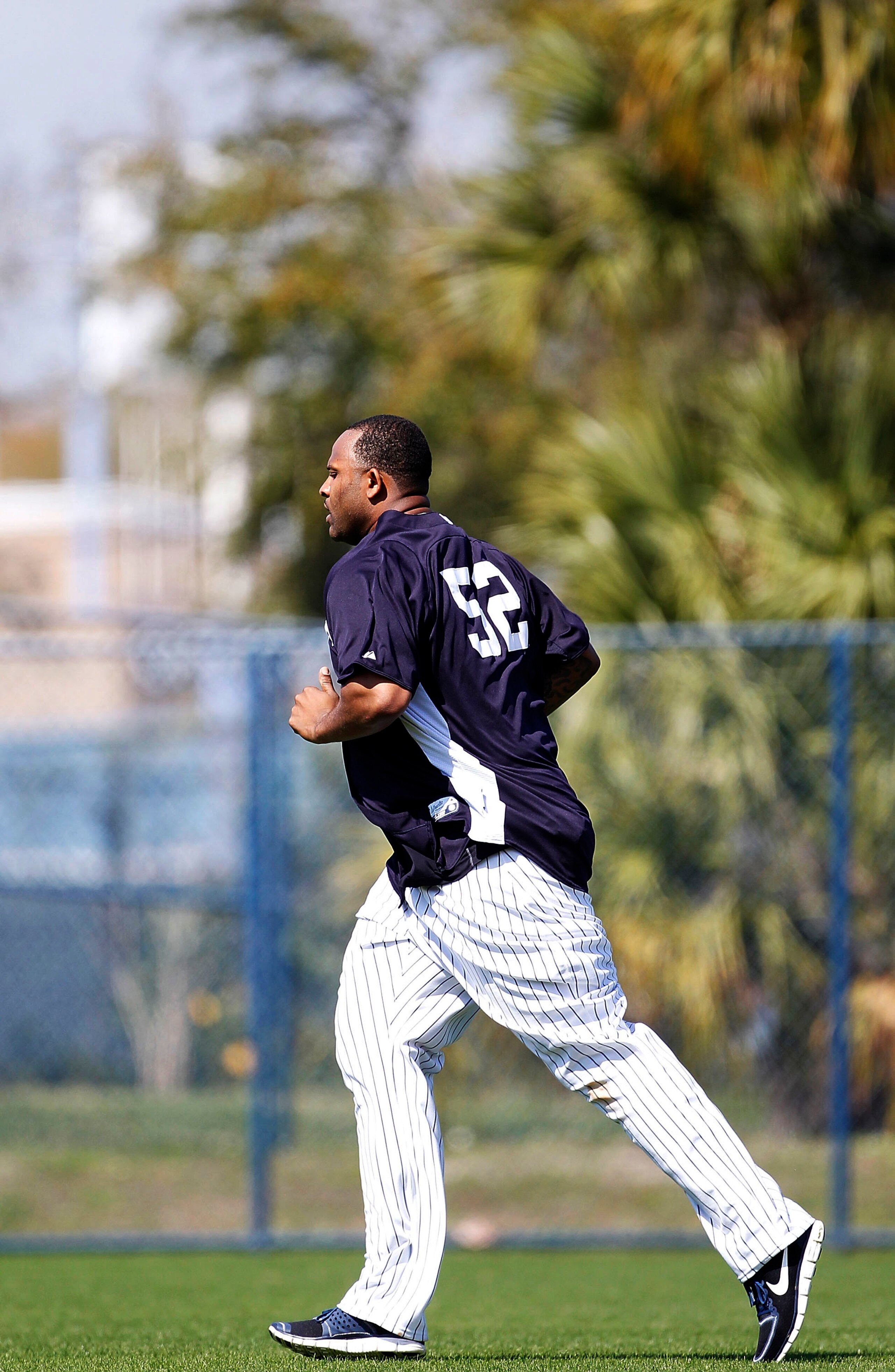 TAMPA, FL - FEBRUARY 21:  CC Sabathia #52 of the New York Yankees works out during the second day of full teams workouts at Spring Training on February 21, 2011 at the George M. Steinbrenner Field in Tampa, Florida.  (Photo by Leon Halip/Getty Images)