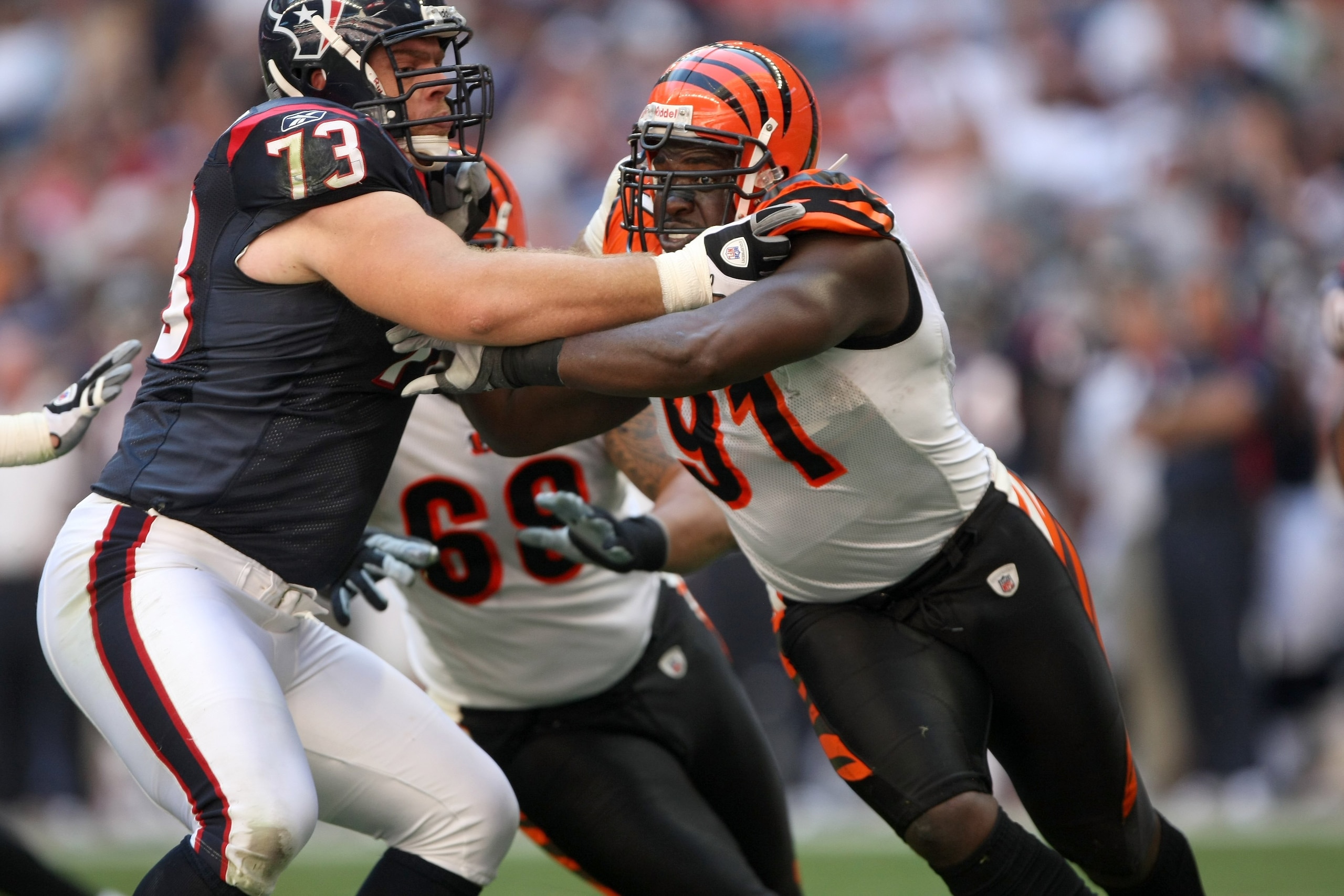 HOUSTON - OCTOBER 26:  Defensive end Robert Geathers #91 of the Cincinnati Bengals tries to fight through the block of tackle Eric Winston #73 of the Houston Texans on October 26, 2008 at Reliant Stadium in Houston, Texas. The Texans won 35-6.  (Photo by