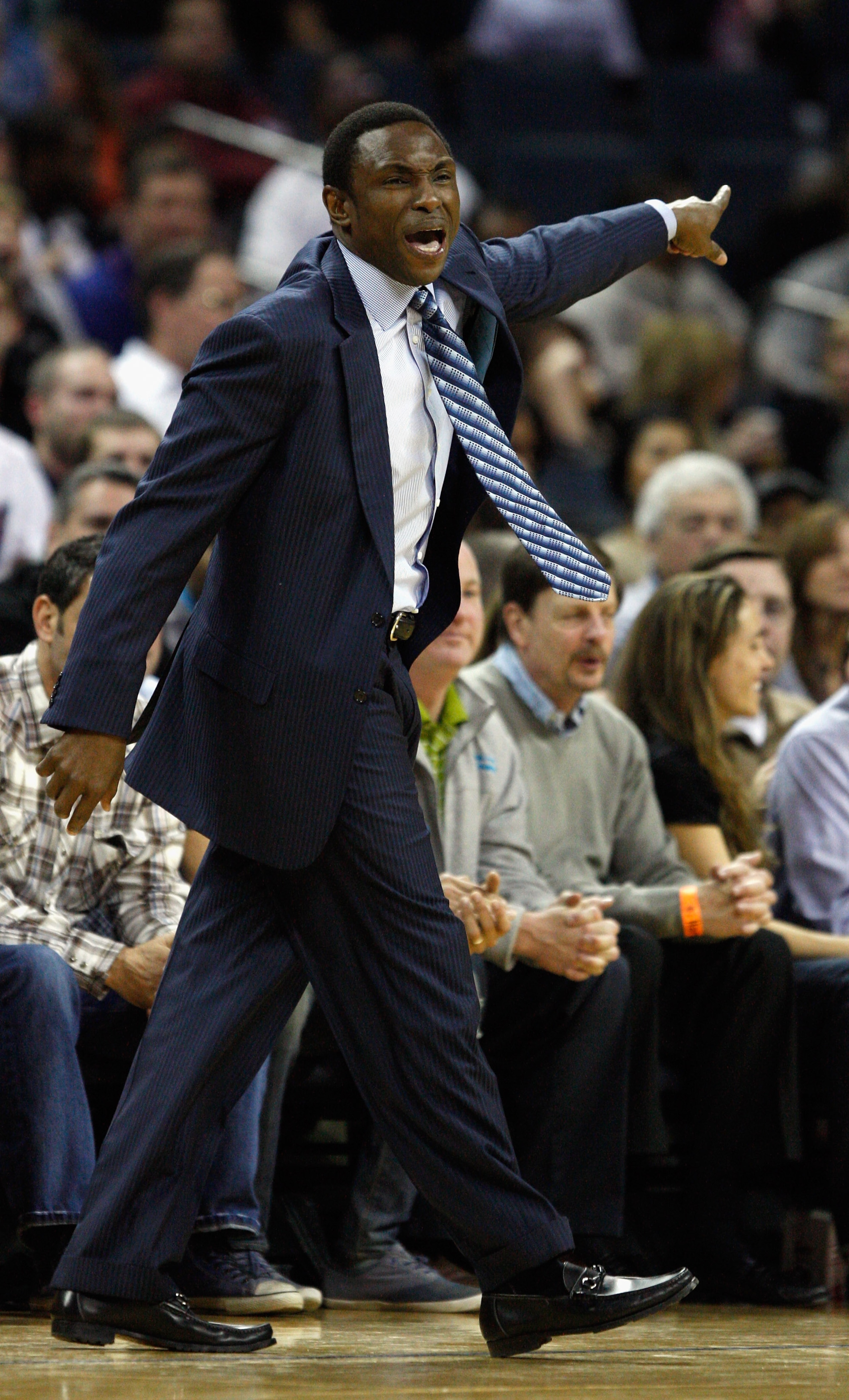 CHARLOTTE, NC - FEBRUARY 11:  Head coach Avery Johnson of the New Jersey Nets calls out to his team against the Charlotte Bobcats during their game at Time Warner Cable Arena on February 11, 2011 in Charlotte, North Carolina. NOTE TO USER: User expressly