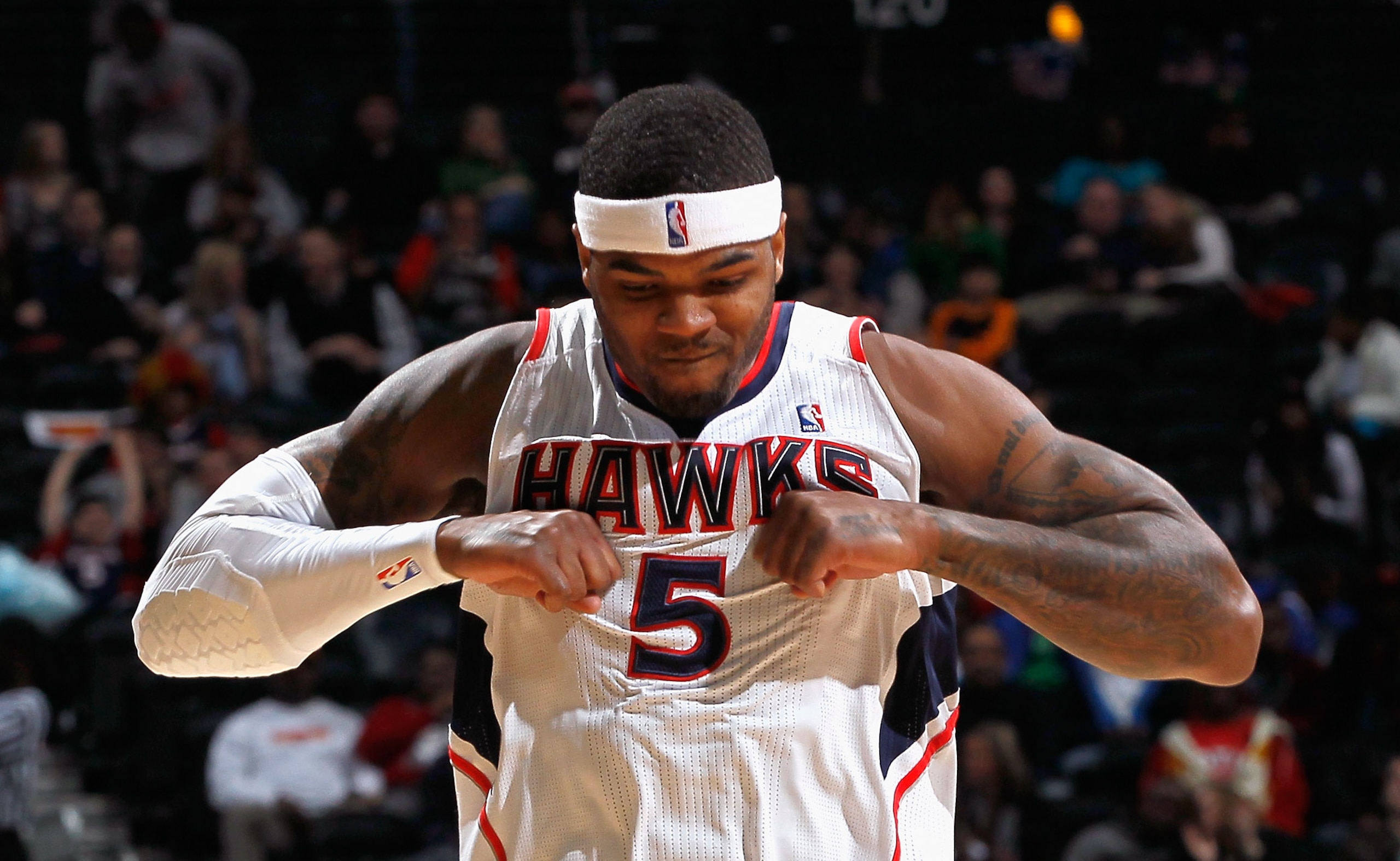 ATLANTA, GA - FEBRUARY 12:  Josh Smith #5 of the Atlanta Hawks reacts after hitting a three-point basket against the Charlotte Bobcats at Philips Arena on February 12, 2011 in Atlanta, Georgia.  NOTE TO USER: User expressly acknowledges and agrees that, b