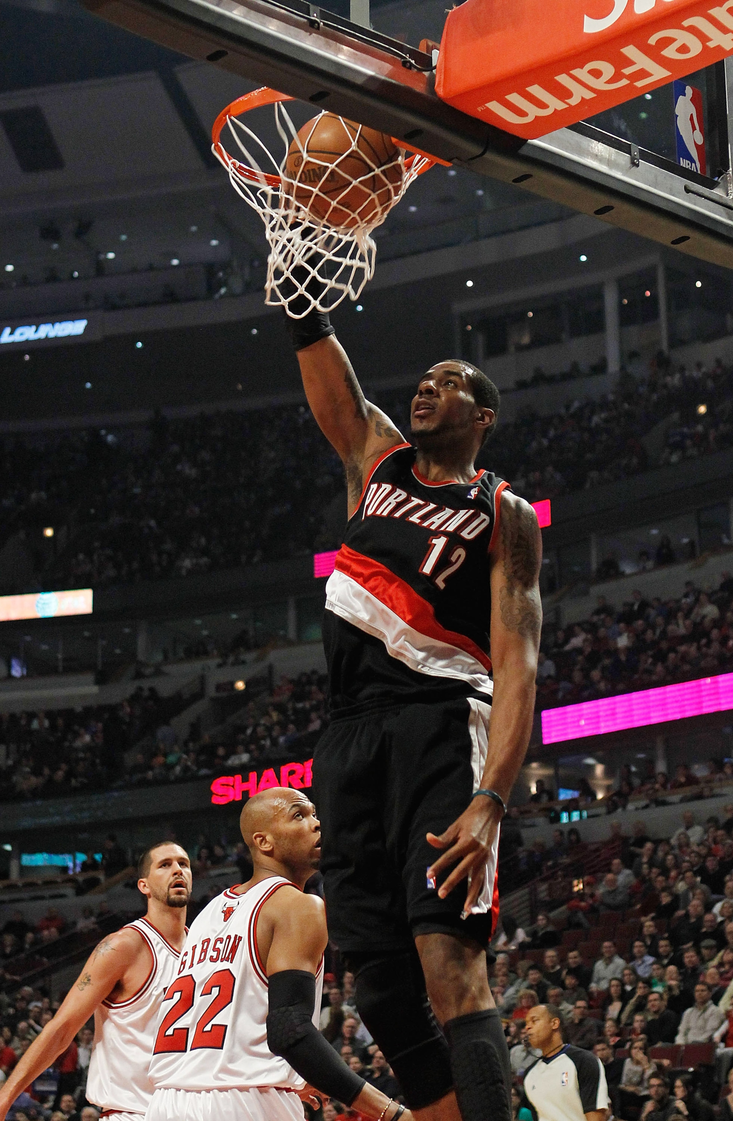CHICAGO - FEBRUARY 26: LaMarcus Aldridge #12 of the Portland Trail Blazers dunks the ball against the Chicago Bulls at the United Center on February 26, 2010 in Chicago, Illinois. NOTE TO USER: User expressly acknowledges and agrees that, by downloading a