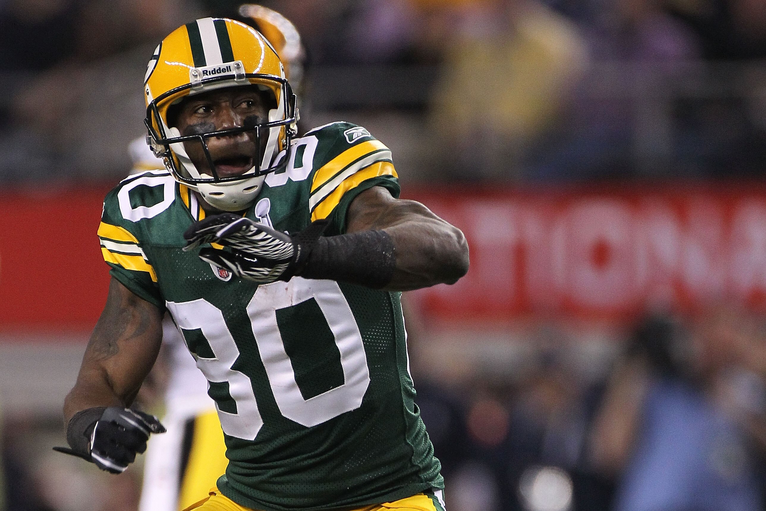ARLINGTON, TX - FEBRUARY 06:  Donald Driver #80 of the Green Bay Packers reacts after catching a 24 yard pass against the Pittsburgh Steelers during the first quarter of Super Bowl XLV at Cowboys Stadium on February 6, 2011 in Arlington, Texas.  (Photo by
