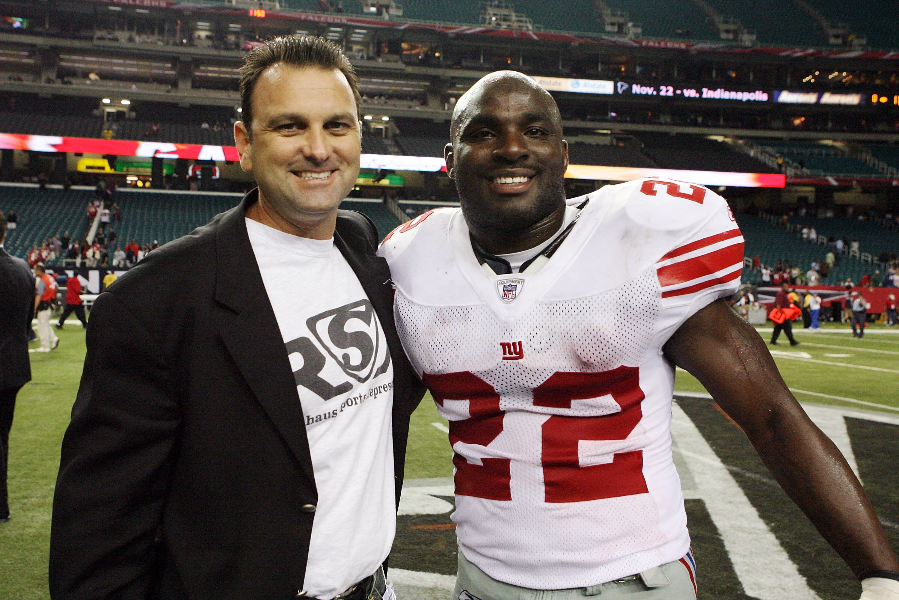 ATLANTA - OCTOBER 15:  Agent Drew Rosenhaus  poses with Reuben Droughns #22 of the New York Giants after the game against the Atlanta Falcons at Georgia Dome on October 15, 2007 in Atlanta, Georgia. The Giants defeated the Falcons 31-10 for their fourth s
