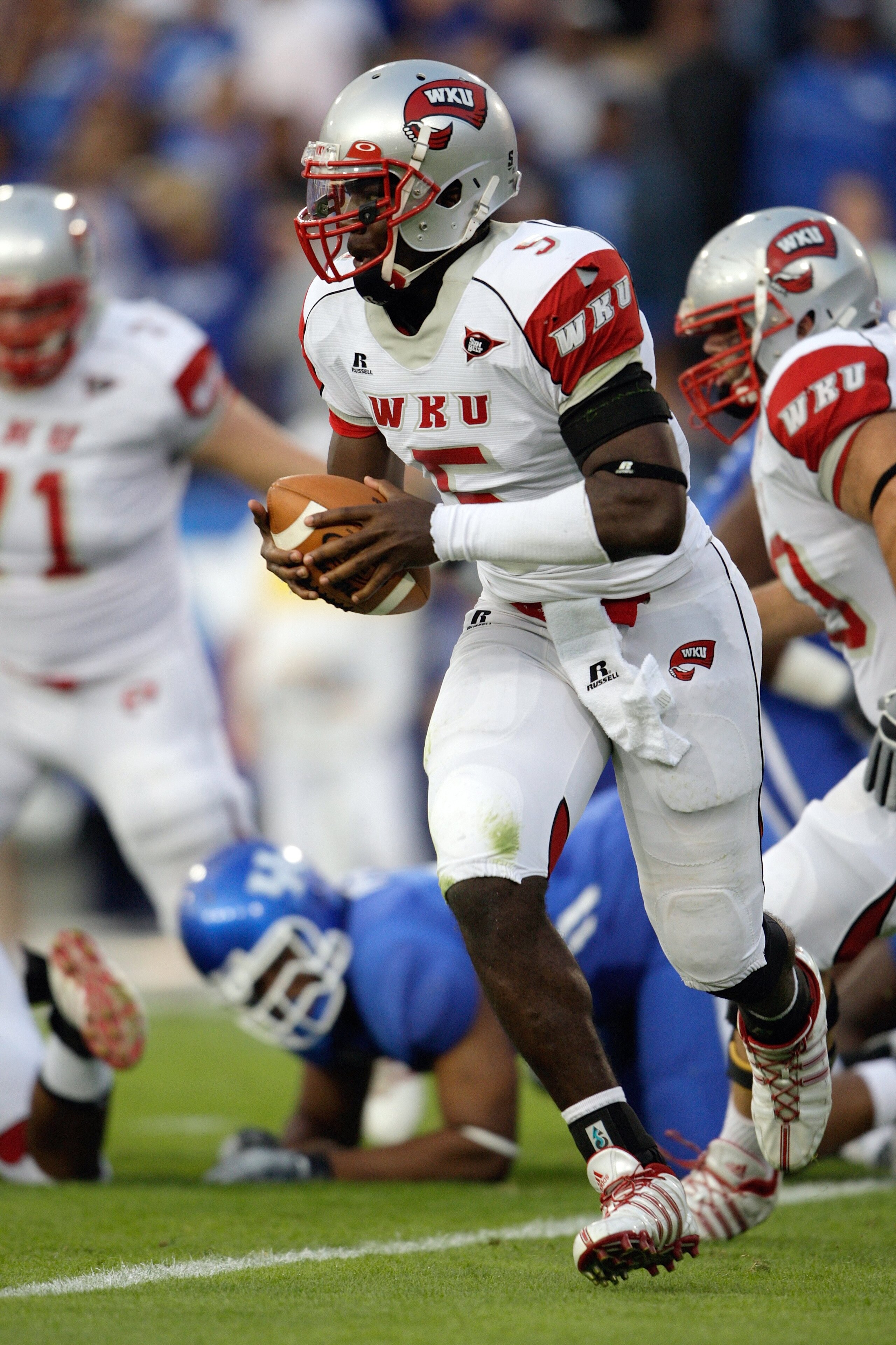 LEXINGTON, KY - SEPTEMBER 27:  Quarterback K.J. Black #5 of the Western Kentucky Hilltoppers looks to run with the ball against the Kentucky Wildcats during the game at Commonwealth Stadium on September 27, 2008 in Lexington, Kentucky. The Wildcats defeat
