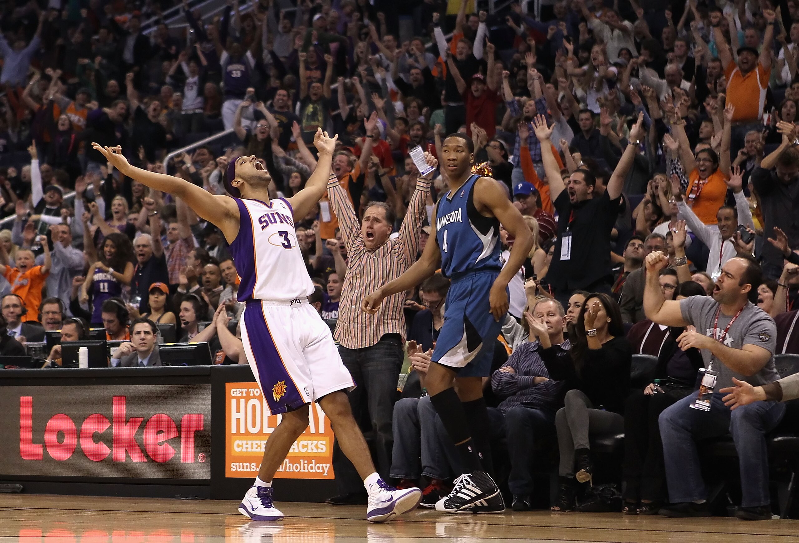 PHOENIX - DECEMBER 15:  Jared Dudley #3 of the Phoenix Suns reacts after hitting a three point shot over Wesley Johnson #4 of the Minnesota Timberwolves during the NBA game at US Airways Center on December 15, 2010 in Phoenix, Arizona. The Suns defeated t