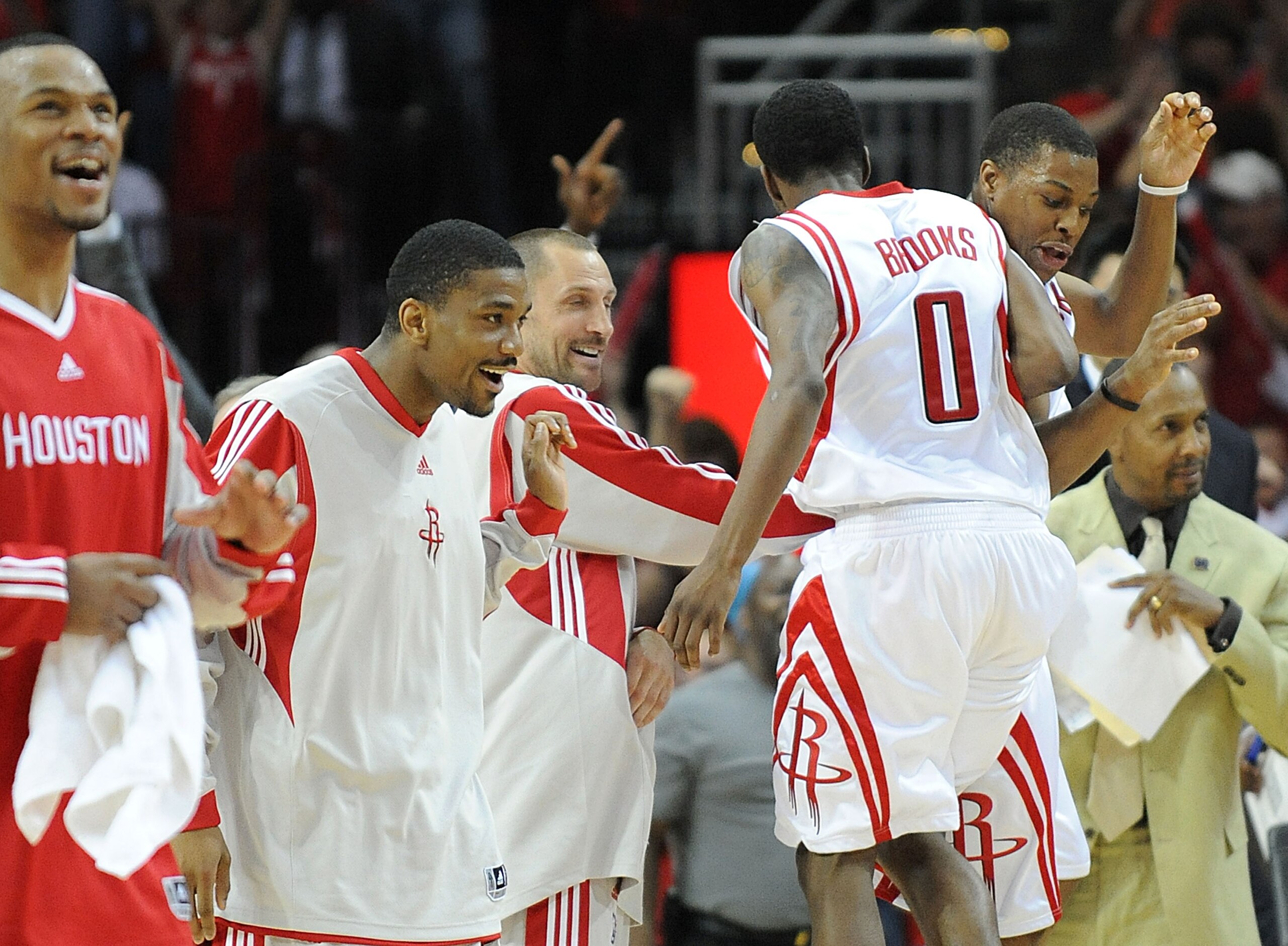 HOUSTON - MAY 10:  Guard Aaron Brooks #0 of the Houston Rockets celebrates after making a three-point shot against the Los Angeles Lakers in Game Four of the Western Conference Semifinals during the 2009 NBA Playoffs at Toyota Center on May 10, 2009 in Ho