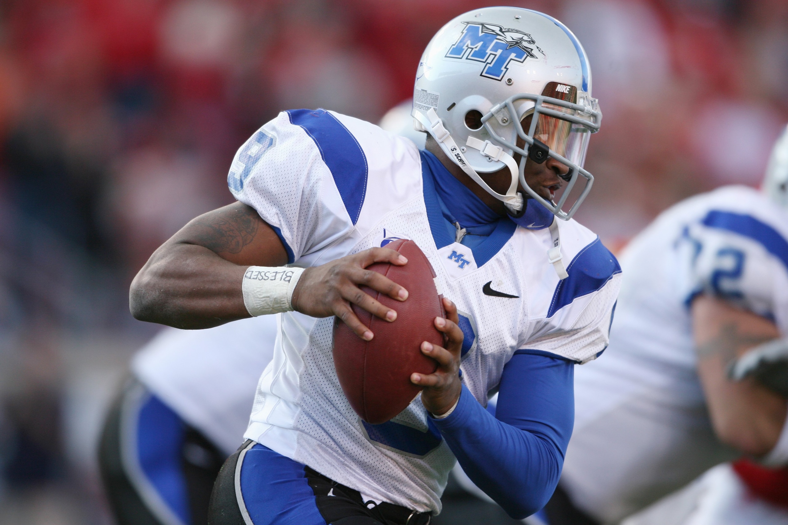 LOUISVILLE, KY - OCTOBER 18:  Quarterback Dwight Dasher #9 of the Middle Tennessee Blue Raiders looks to throw against the Louisville Cardinals during the game at Papa John's Cardinal Stadium on October 18, 2008 in Louisville, Kentucky.  Louisville defeat