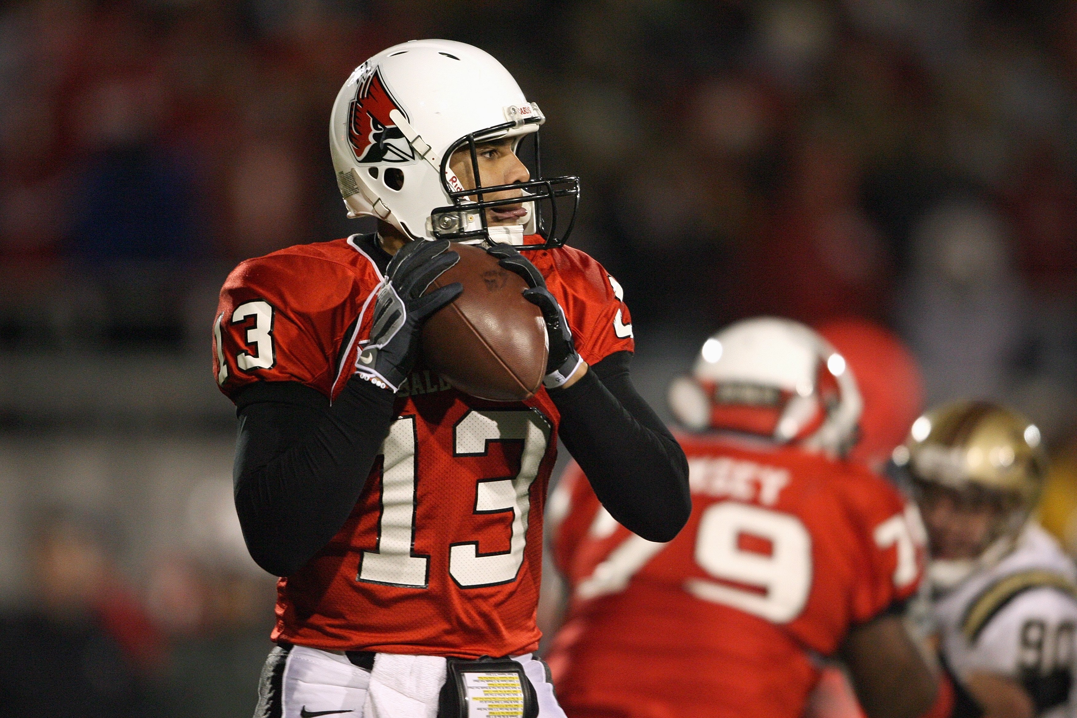 MUNCIE, IN - NOVEMBER 25:  Quarterback Nate Davis #13  of the Ball State Cardinals looks to pass the ball during the MAC game against the Western Michigan Broncos at Scheumann Stadium on November 25, 2008 in Muncie, Indiana.  (Photo by Andy Lyons/Getty Im