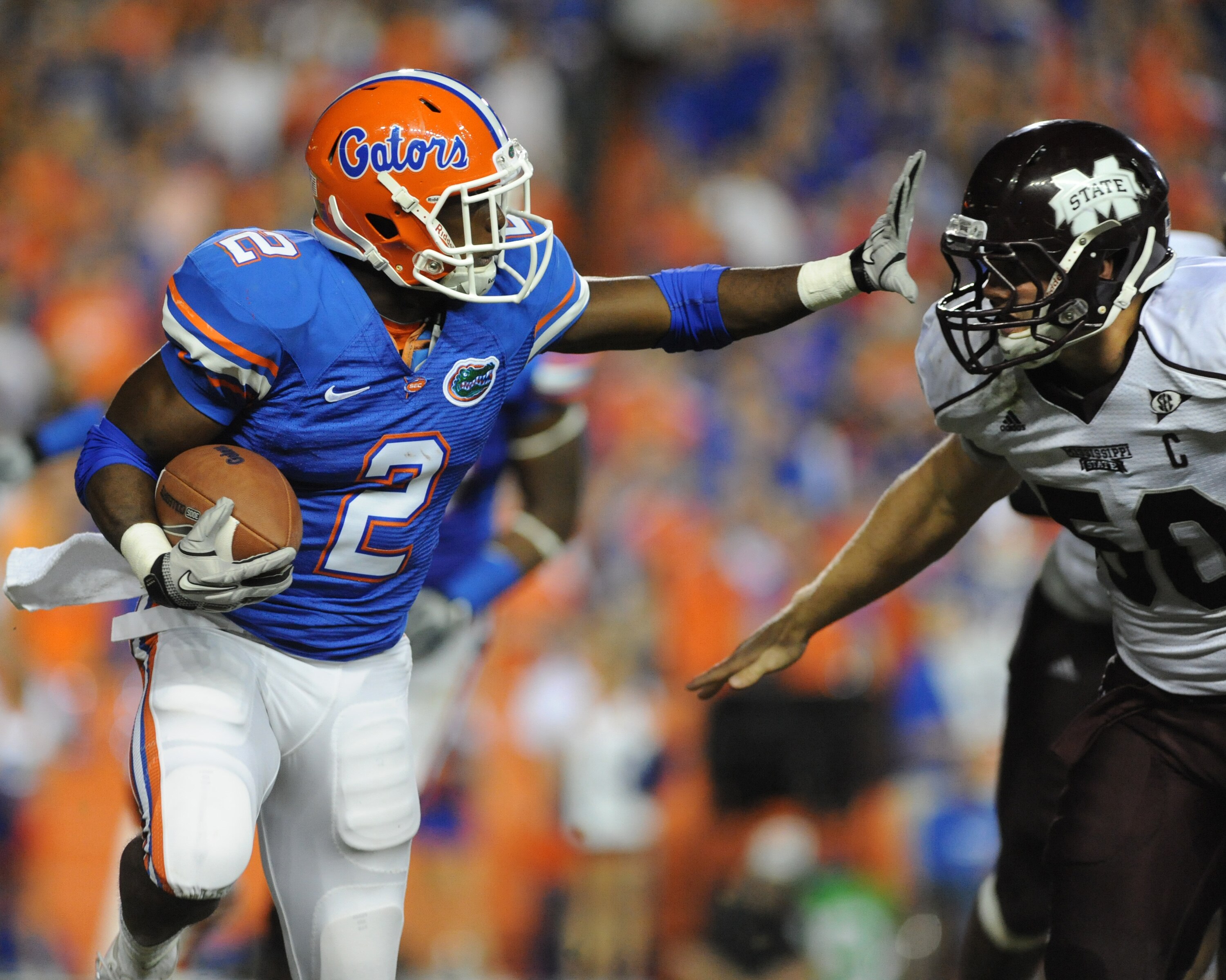 GAINESVILLE, FL - OCTOBER 16:  Running back Jeff Demps #2 of the Florida Gators rushes upfield against the Mississippi State Bulldogs October 16, 2010 Ben Hill Griffin Stadium at Gainesville, Florida.  (Photo by Al Messerschmidt/Getty Images)