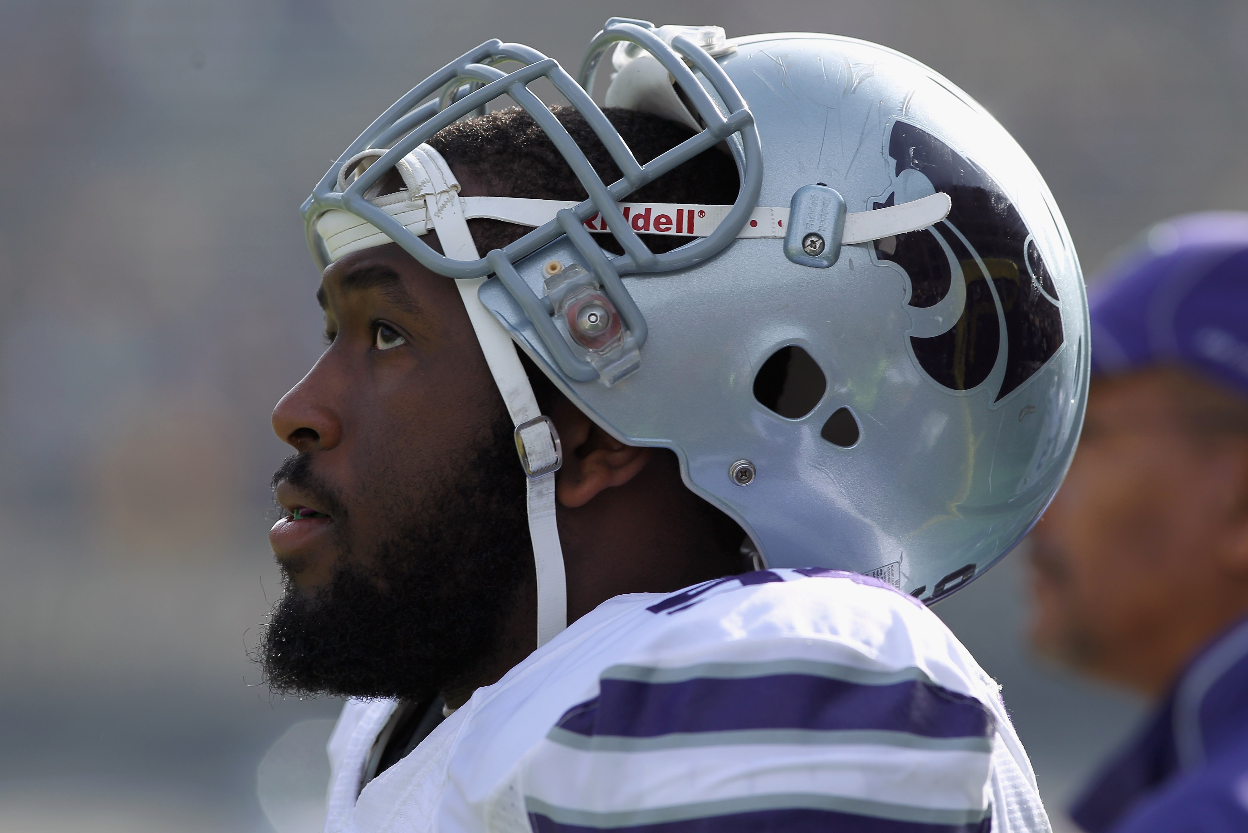BOULDER, CO - NOVEMBER 20:  Defensive tackle Raphael Guidry #94 of the Kansas State Wildcats rushes looks on from the sidelines against the Colorado Buffaloes at Folsom Field on November 20, 2010 in Boulder, Colorado. Colorado defeated Kansas State 44-36.