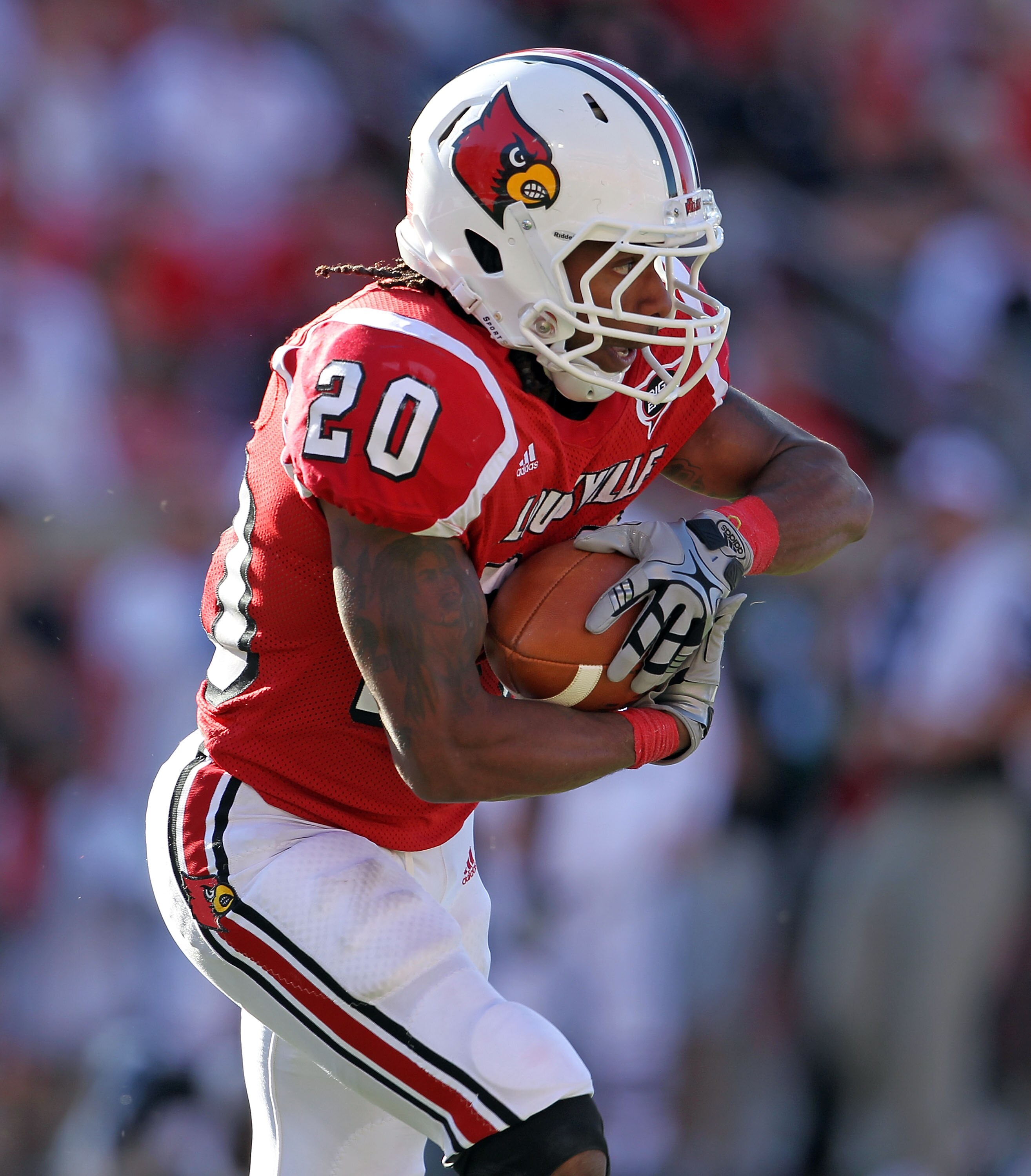 LOUISVILLE, KY - SEPTEMBER 04:  Victor Anderson #20 of the Louisville Cardinals runs with the ball during the game against the Kentucky Wildcats at Papa John's Cardinal Stadium on September 4, 2010 in Louisville, Kentucky.  (Photo by Andy Lyons/Getty Imag