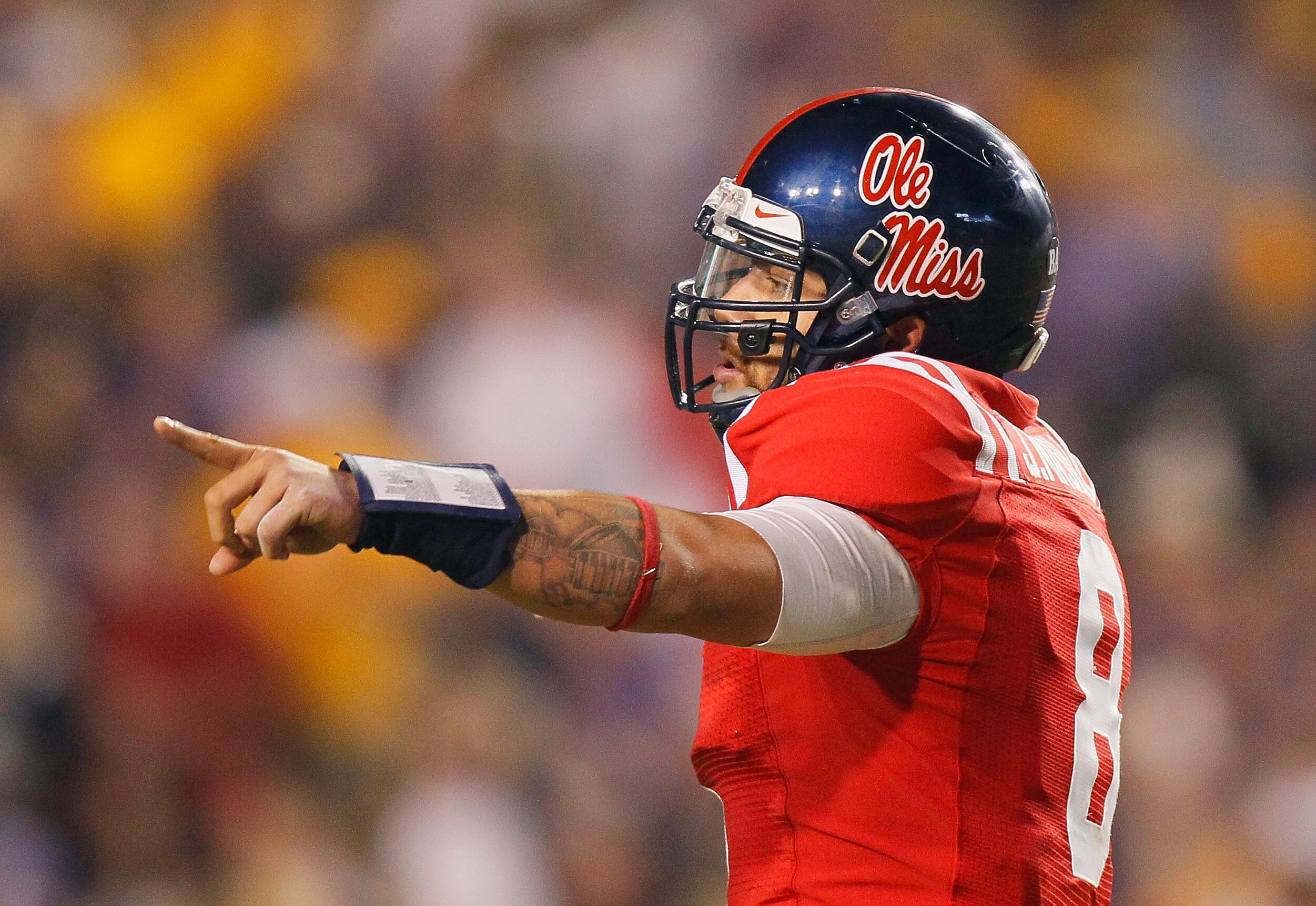 BATON ROUGE, LA - NOVEMBER 20:  Jeremiah Masoli #8 of the Ole Miss Rebels against the Louisiana State University Tigers at Tiger Stadium on November 20, 2010 in Baton Rouge, Louisiana.  (Photo by Kevin C. Cox/Getty Images)