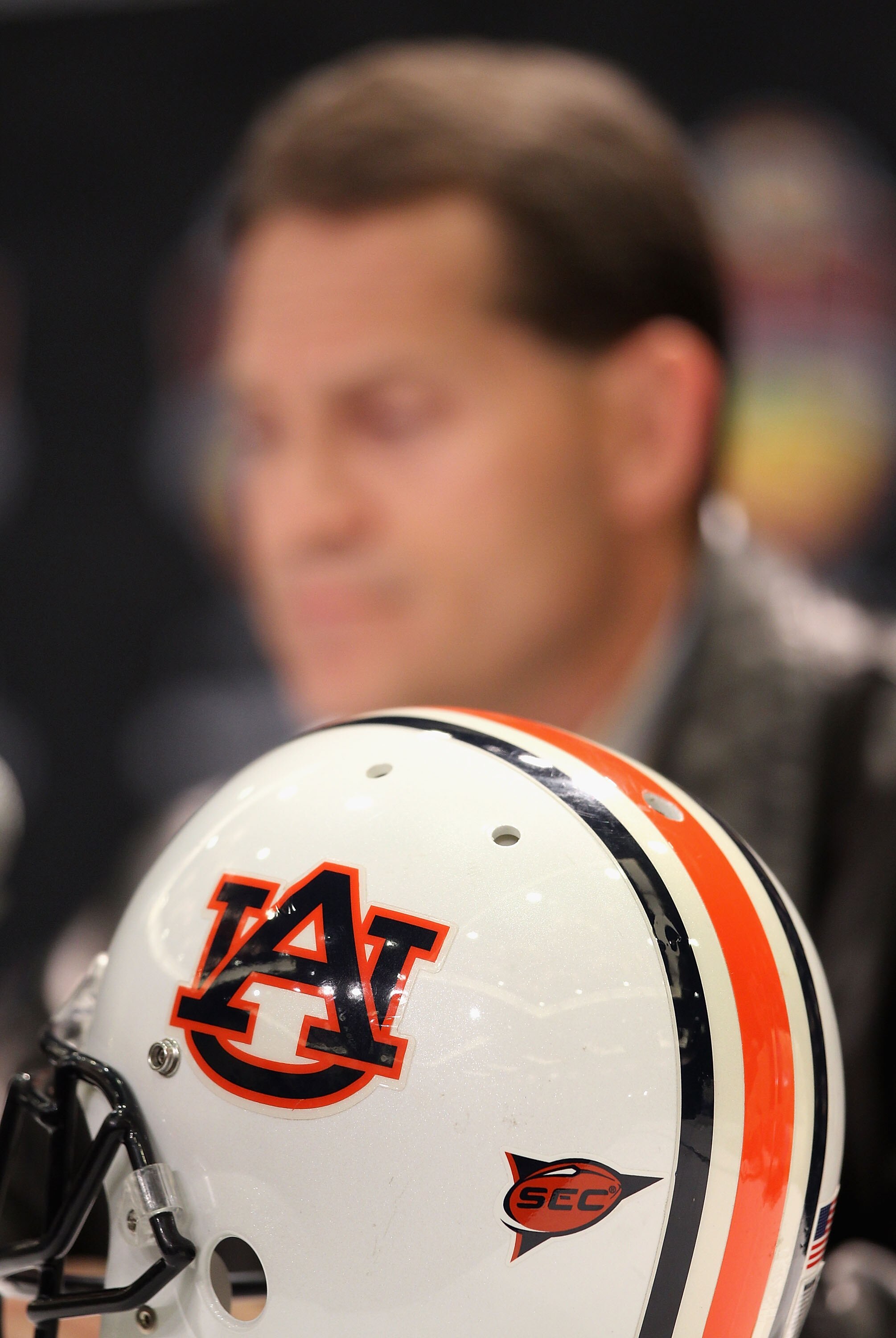 SCOTTSDALE, AZ - JANUARY 11:  Head coach Gene Chizik of the Auburn Tigers speaks to the media during a press conference for the Tostitos BCS National Championship Game at the JW Marriott Camelback Inn on January 11, 2011 in Scottsdale, Arizona.  (Photo by
