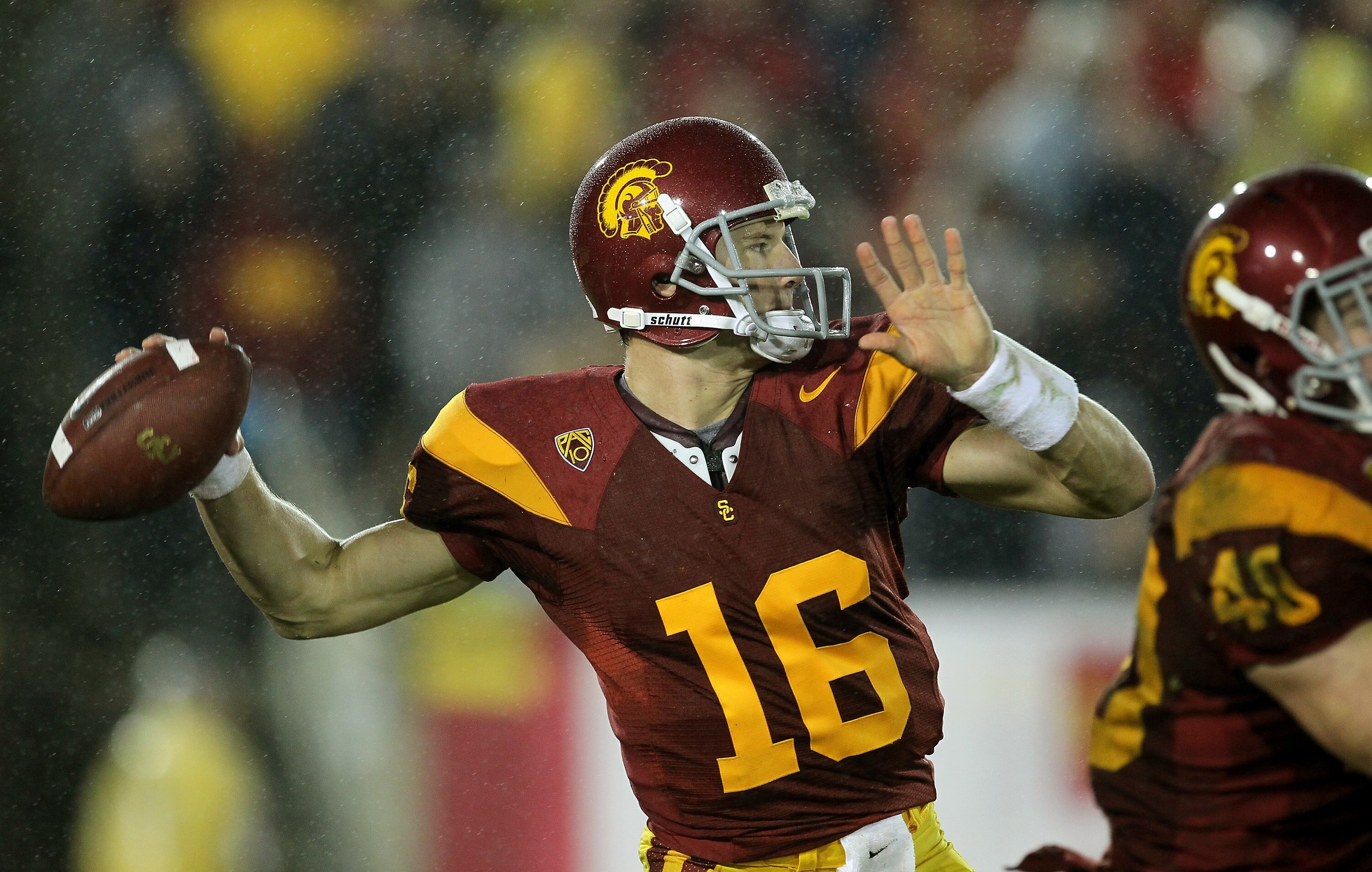 LOS ANGELES - NOVEMBER 27: Quarterback Mitch Mustain #16 of the USC Trojans throws a pass against the Notre Dame Fighting Irish at the Los Angeles Memorial Coliseum on November 27, 2010 in Los Angeles, California.  Notre Dame won 20-16.  (Photo by Stephen