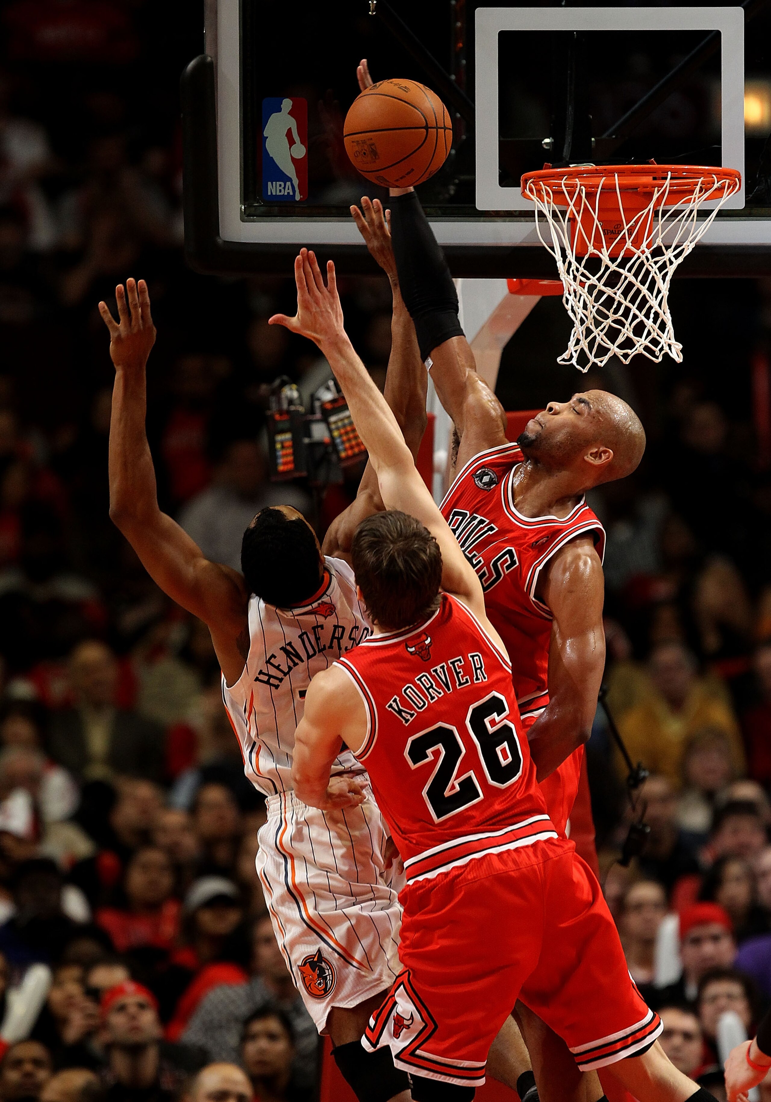 CHICAGO, IL - FEBRUARY 15: Taj Gibson #22 of the Chicago Bulls blocks a shot by Gerald Henderson #15 of the Charlotte Bobcats as Kyle Korver #26 defends at the United Center on February 15, 2011 in Chicago, Illinois. The Bulls defeated the Bobcats 106-94.
