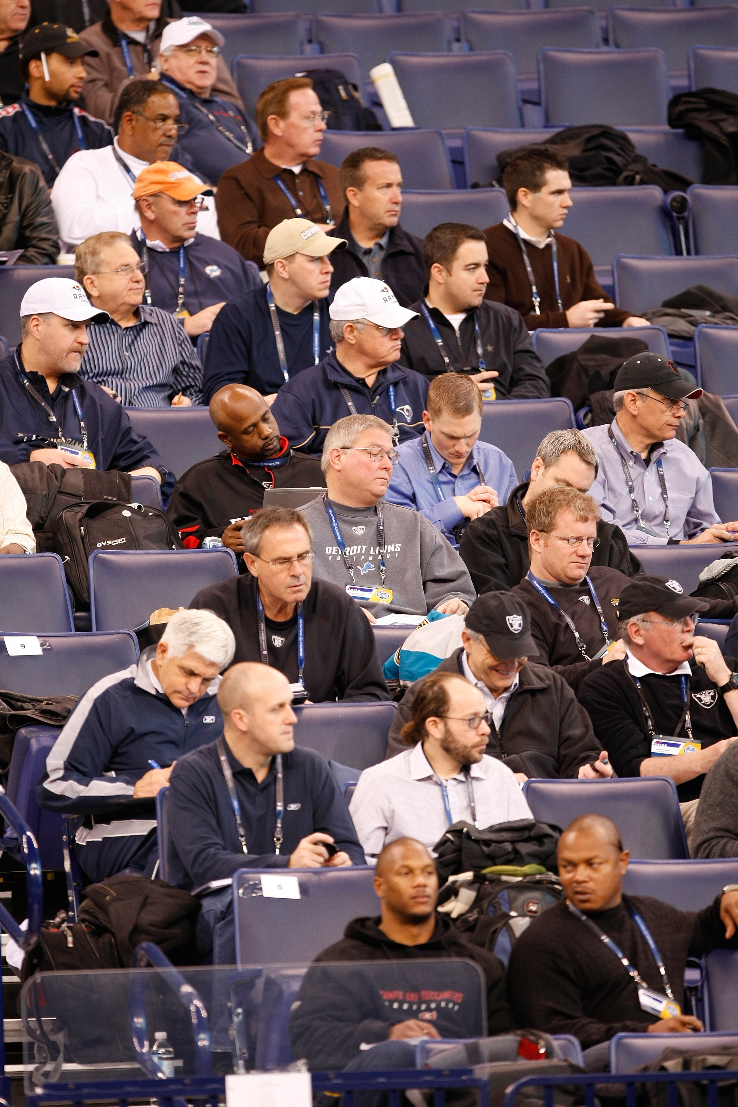 INDIANAPOLIS, IN - FEBRUARY 24:  Coaches and scouts of NFL teams watch from the stands during the NFL Scouting Combine at Lucas Oil Stadium on February 24, 2009 in Indianapolis, Indiana. (Photo by Scott Boehm/Getty Images)