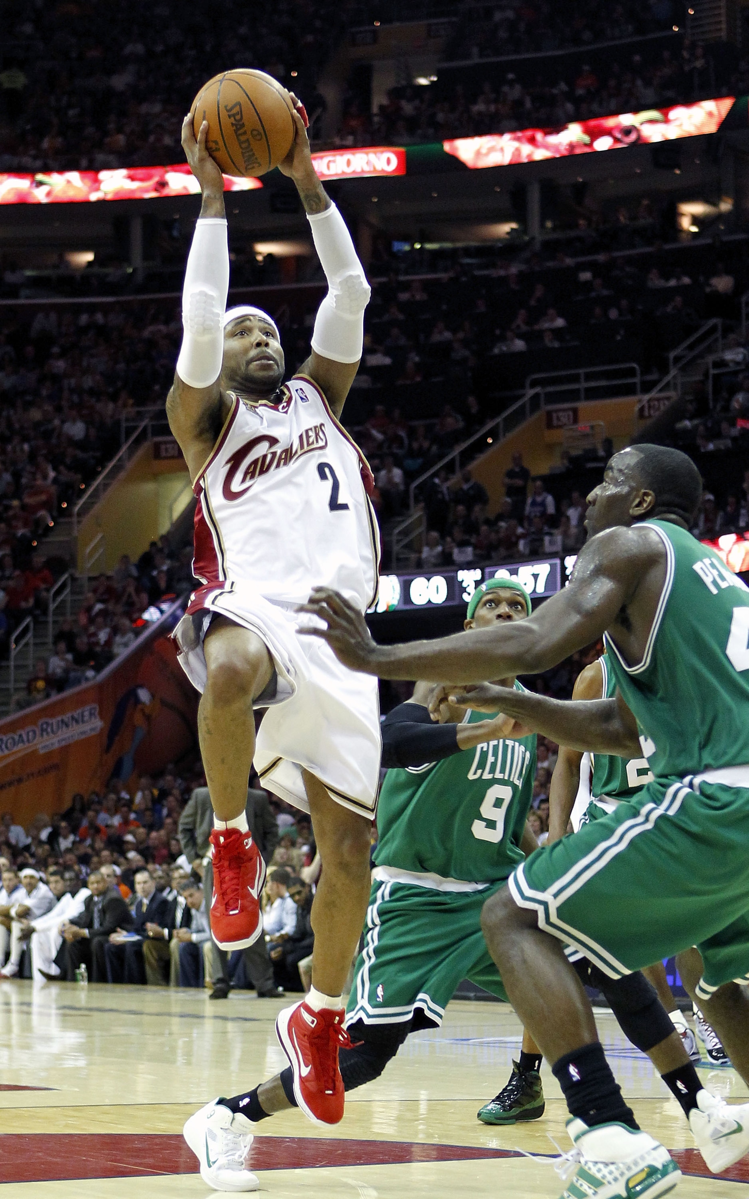 CLEVELAND - MAY 01:  Mo Williams #2 of the Cleveland Cavaliers gets a shot off over Kendrick Perkins #43 of the Boston Celtics during Game One of the Eastern Conference Semifinals during the 2010 NBA Playoffs at Quicken Loans Arena on May 1, 2010 in Cleve