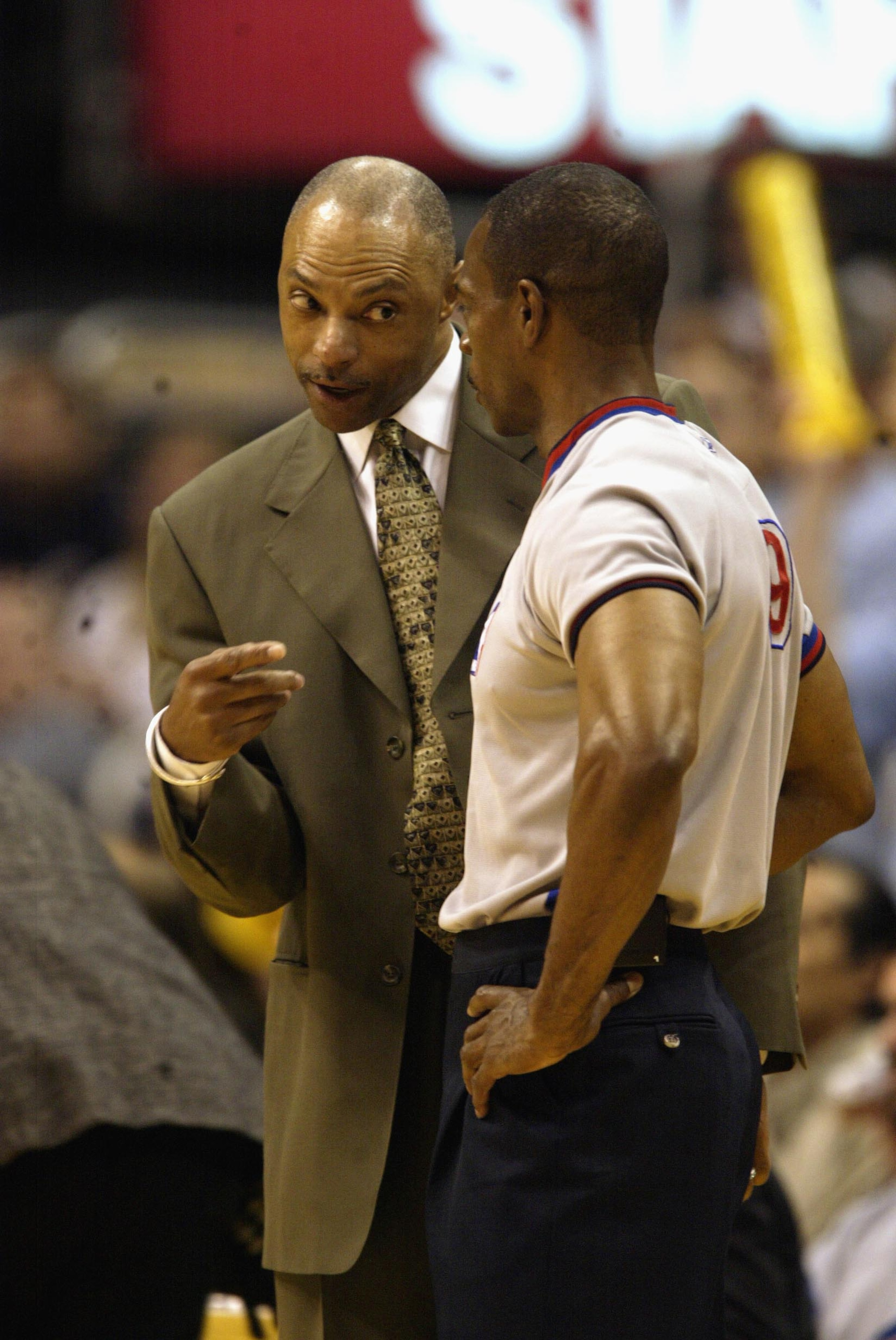 LOS ANGELES - MAY 11:  Assistant coach Jim Cleamons of the Los Angeles Lakers argues with referee Tom Washington in Game four of the Western Conference Semifinals against the San Antonio Spurs during the 2003 NBA Playoffs on May 11, 2003 at Staples Center