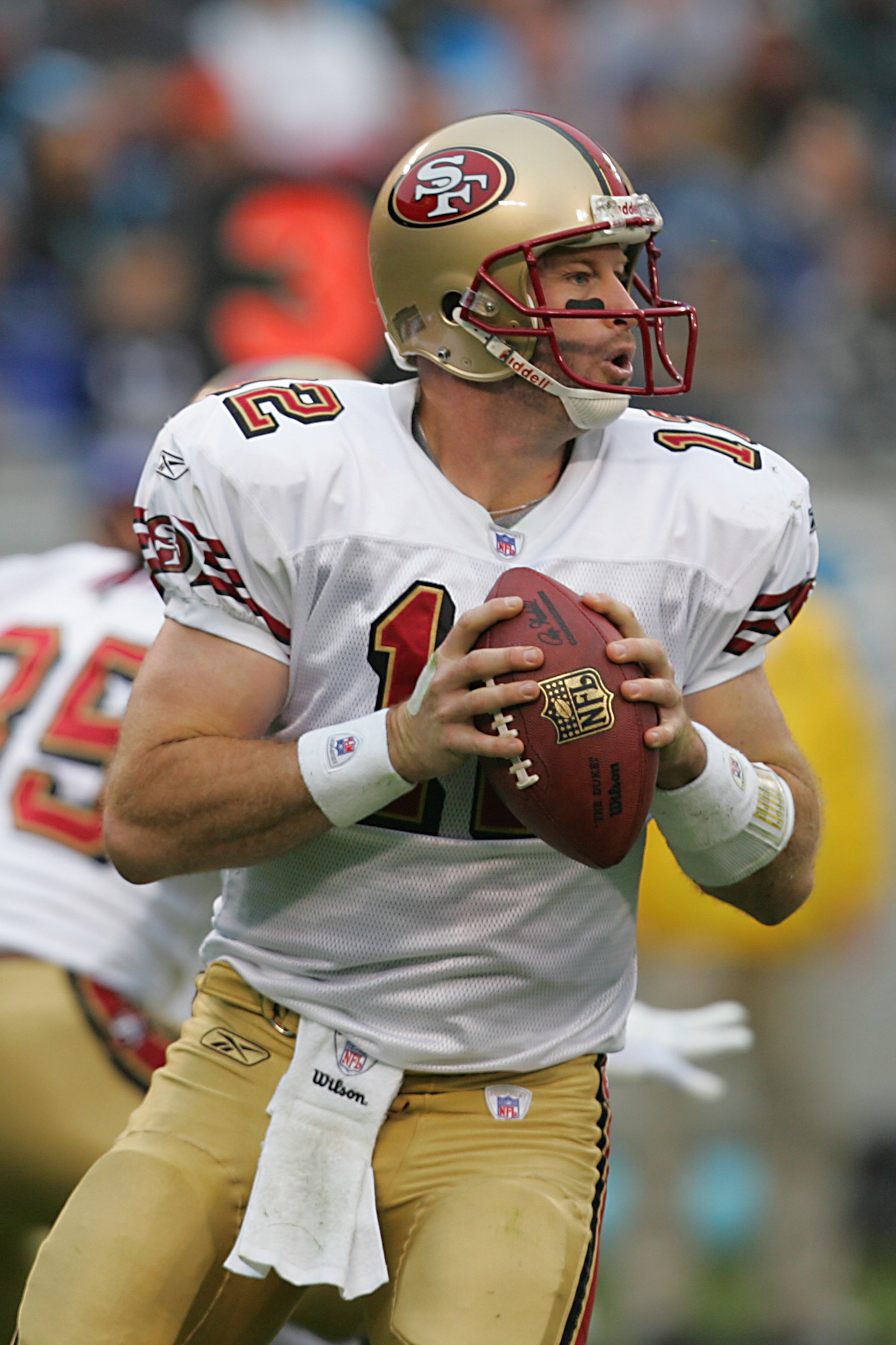 CHARLOTTE - DECEMBER 2:  Trent Dilfer #12 of the San Francisco 49ers looks to pass during the NFL game against the Carolina Panthers at the Bank of America Stadium on December 2, 2007 in Charlotte, North Carolina. (Photo by Streeter Lecka/Getty Images)