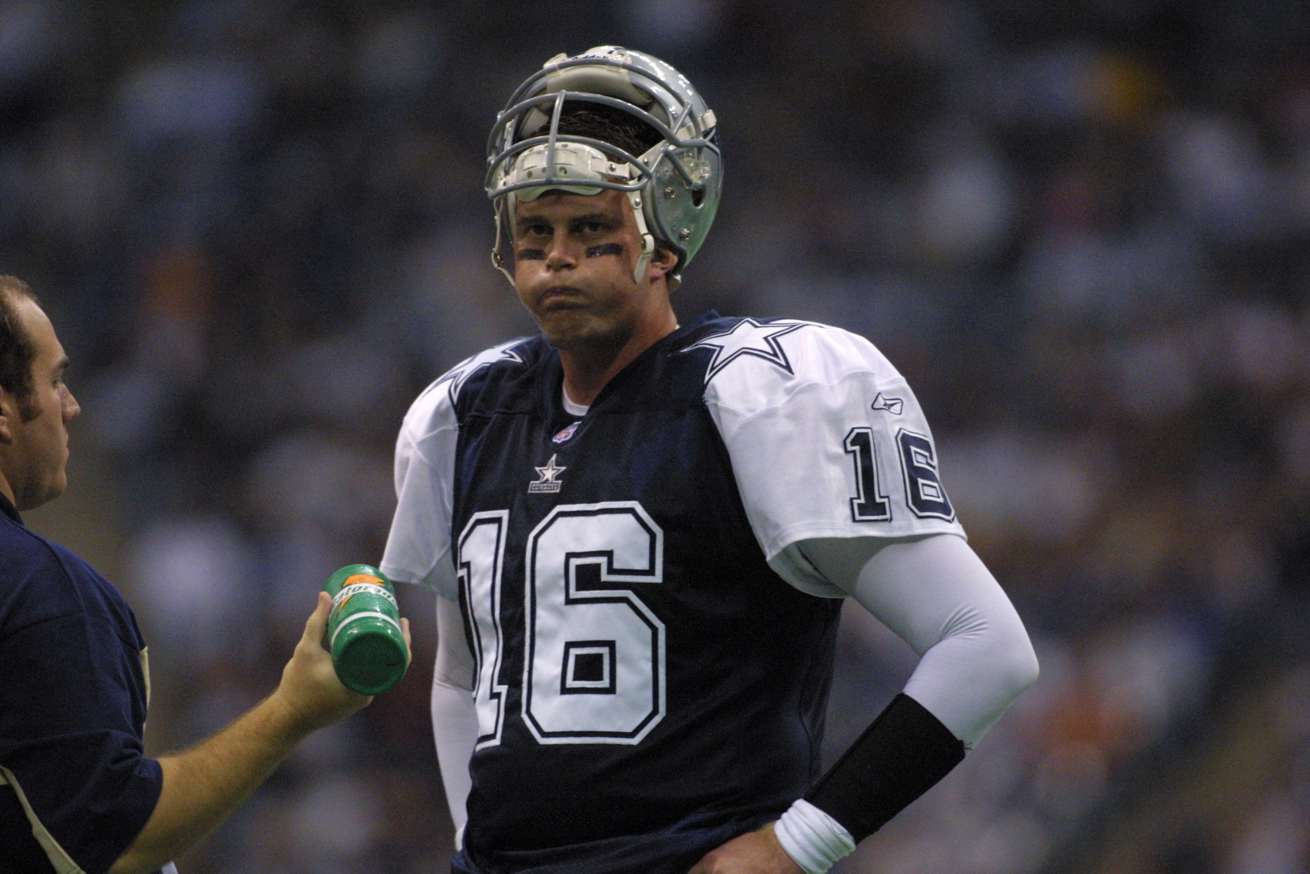 22 Nov 2001 : Quarterback Ryan Leaf of the Dallas Cowboys rests on the sideline during the game against the Denver Broncos at Texas Stadium in Irving, Texas. The Broncos won 26-24. DIGITAL IMAGE. Mandatory Credit: Ronald Martinez/Getty Images