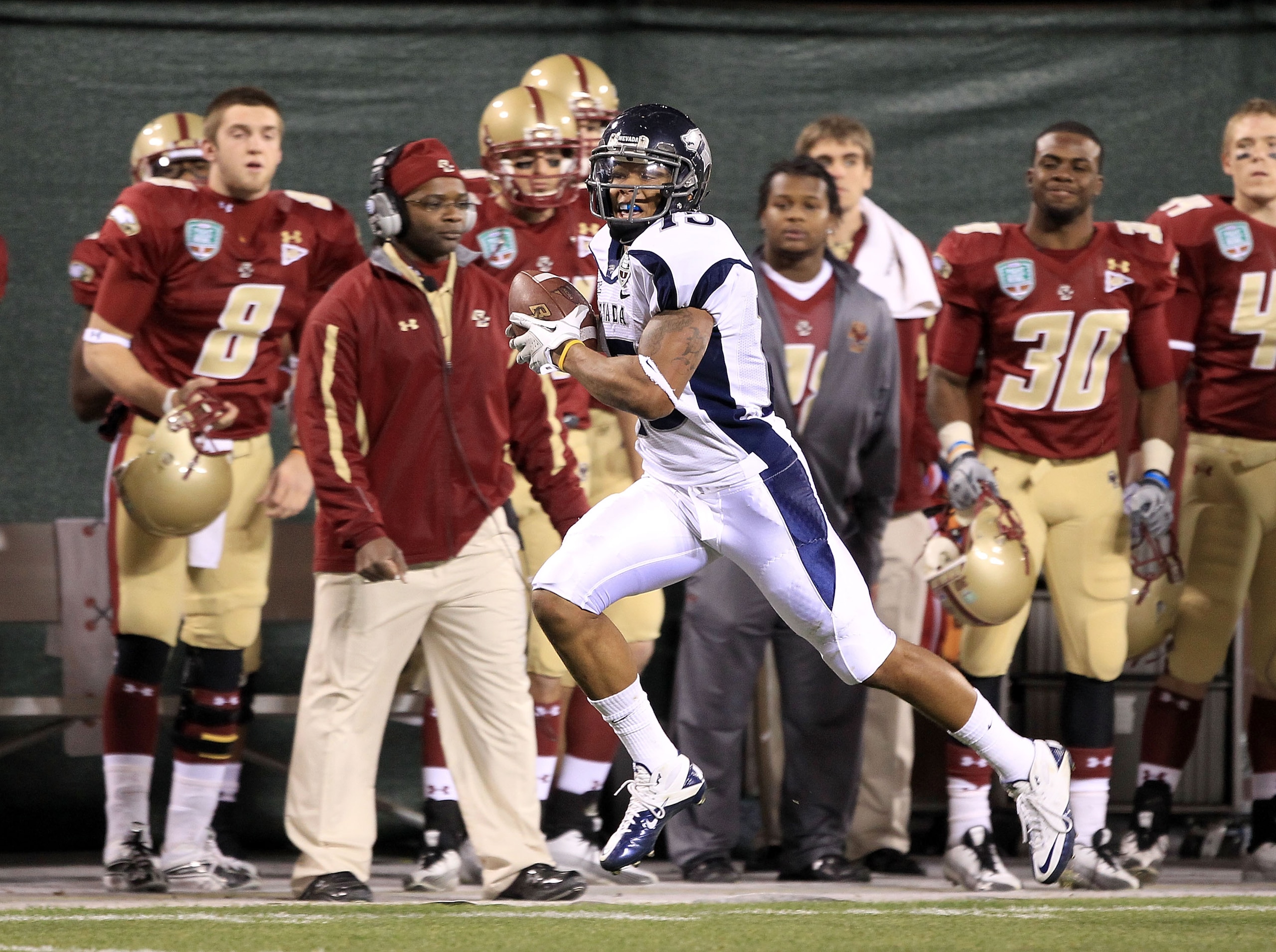 SAN FRANCISCO, CA - JANUARY 09: Richard Matthews #15 of the Nevada Wolf Pack runs for a touchdown against Boston College during the Kraft Fight Hunger Bowl at AT&T Park on January 9, 2011 in San Francisco, California. (Photo by Ezra Shaw/Getty Images) SAN FRANCISCO, CA - JANUARY 09: Richard Matthews #15 of the Nevada Wolf Pack runs for a touchdown against Boston College during the Kraft Fight Hunger Bowl at AT&T Park on January 9, 2011 in San Francisco, California. (Photo by Ezra Shaw/Getty Images)