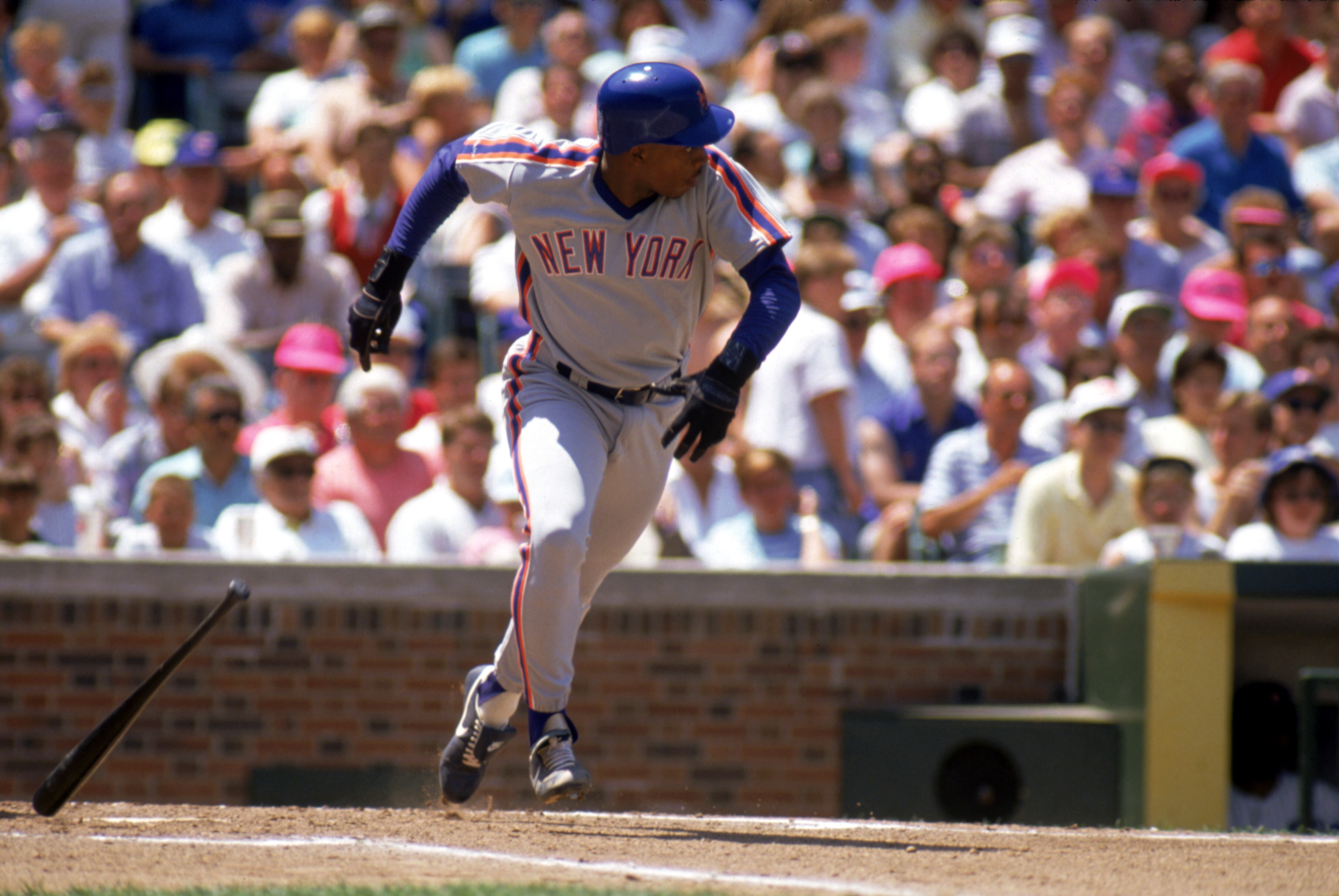 1990: Dwight Gooden of the New York Mets bunts during a game in the 1990 season. ( Photo by: Jonathan Daniel/Getty Images)