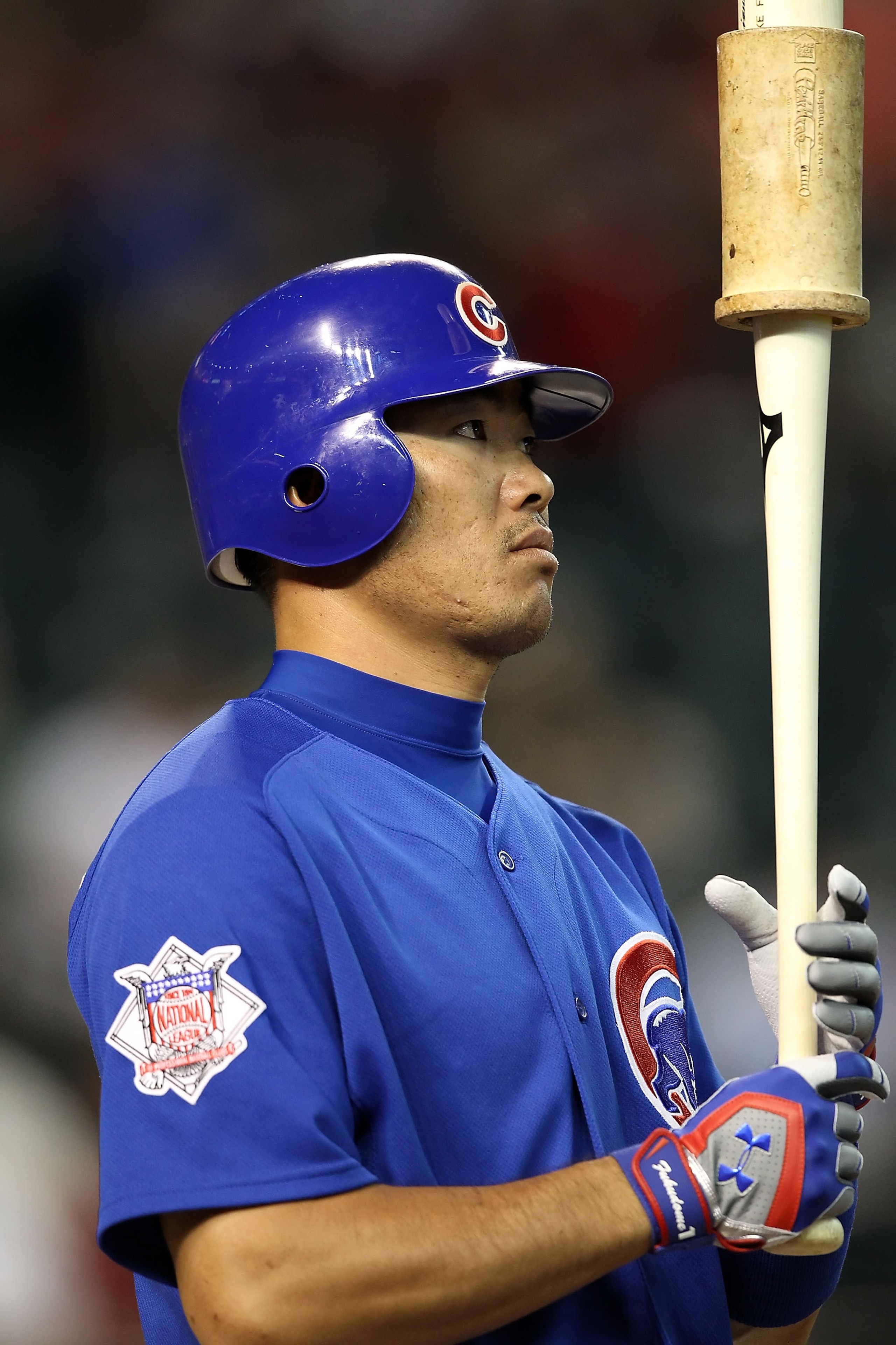 PHOENIX - JULY 05:  Kosuke Fukudome #1 of the Chicago Cubs warms up on deck during the Major League Baseball game against the Arizona Diamondbacks at Chase Field on July 5, 2010 in Phoenix, Arizona. The Cubs defeated the Diamondbacks 9-4.  (Photo by Chris