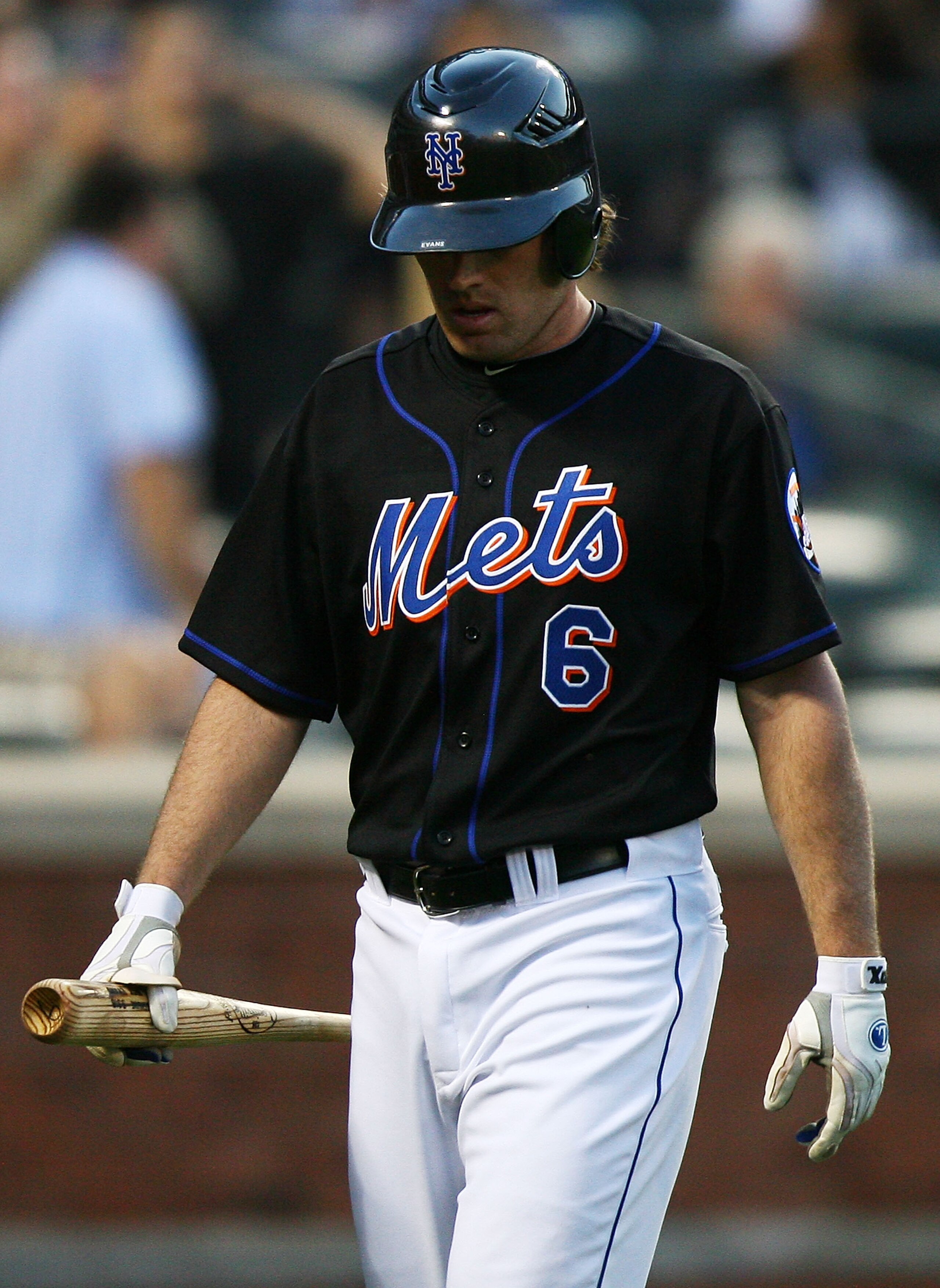 NEW YORK - SEPTEMBER 18: Nick Evans #6 of the New York Mets walks off after striking out in the ninth inning against the Atlanta Braves on September 18, 2010 at Citi Field in the Flushing neighborhood of the Queens borough of New York City. (Photo by An NEW YORK - SEPTEMBER 18: Nick Evans #6 of the New York Mets walks off after striking out in the ninth inning against the Atlanta Braves on September 18, 2010 at Citi Field in the Flushing neighborhood of the Queens borough of New York City. (Photo by An