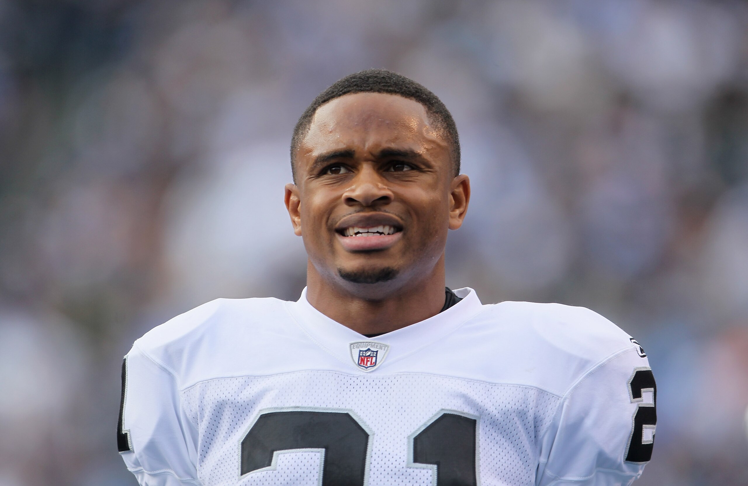 SAN DIEGO - DECEMBER 05:  Nnamdi Asomugha #21 the Oakland Raiders looks on from the sideline against the San Diego Chargers at Qualcomm Stadium on December 5, 2010 in San Diego, California. The Raiders defeated the Chargers 28-13.  (Photo by Jeff Gross/Ge