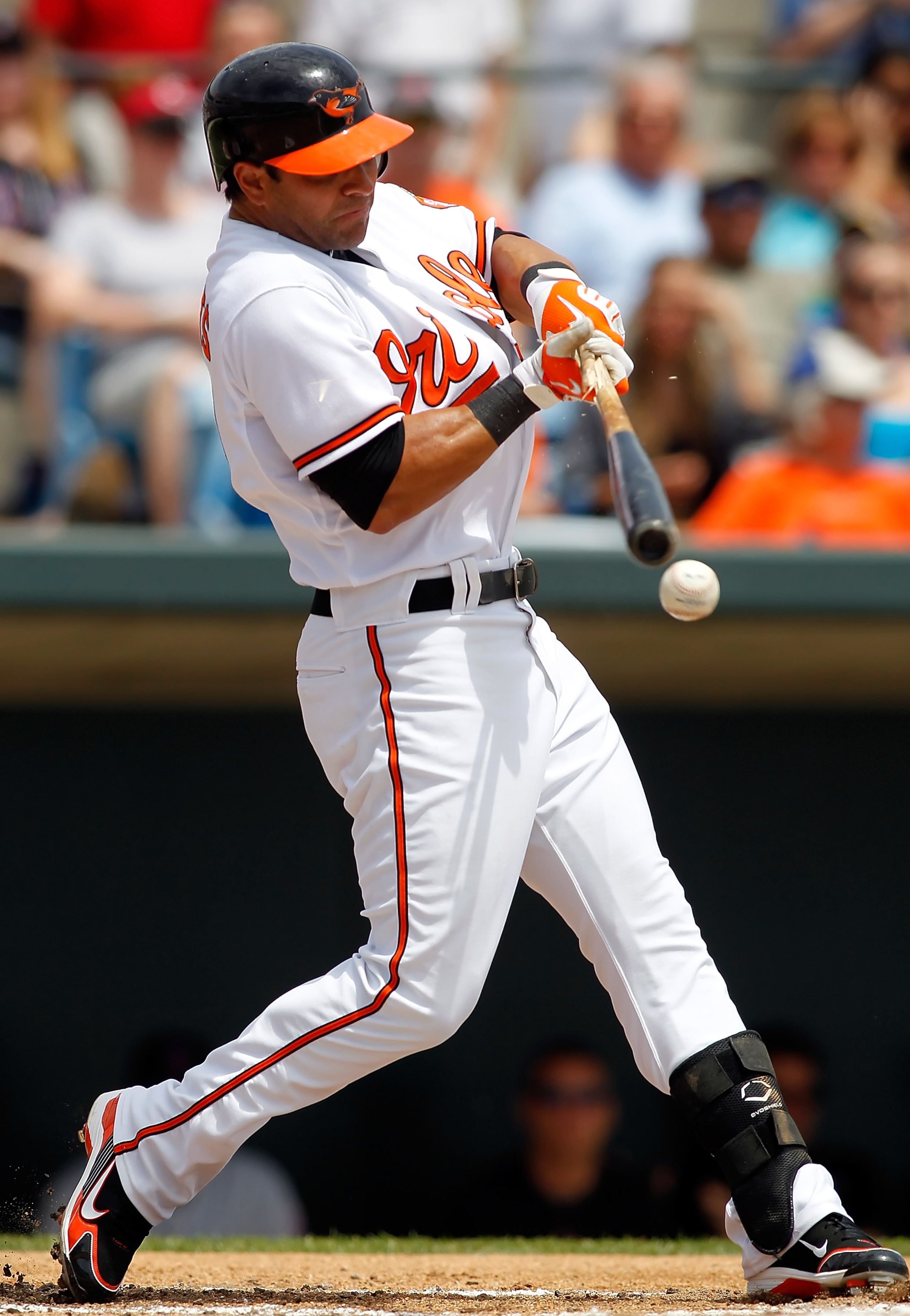 SARASOTA, FL - APRIL 03:  Infielder Brian Roberts #1 of the Baltimore Orioles fouls off a pitch against the New York Mets during a Grapefruit League Spring Training Game at Ed Smith Stadium on April 3, 2010 in Sarasota, Florida.  (Photo by J. Meric/Getty