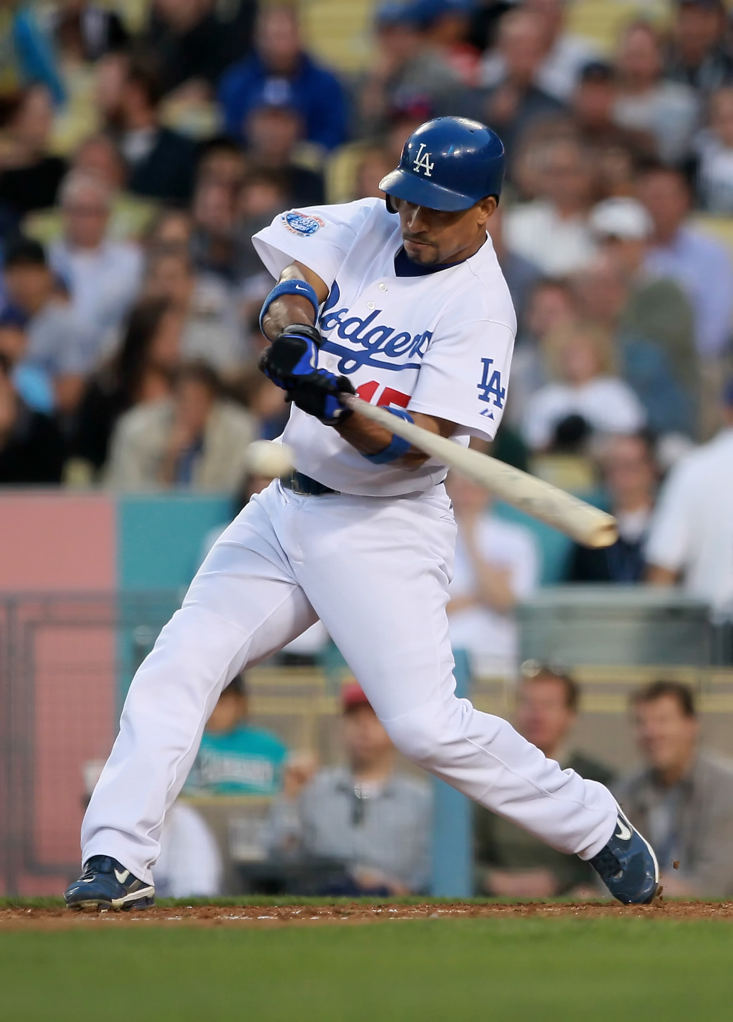 LOS ANGELES, CA - JULY 06:  Rafael Furcal #15 of the Los Angeles Dodgers hits a single scoring two runs in the second inning against the Florida Marlins at Dodger Stadium on July 6, 2010 in Los Angeles, California.  (Photo by Jeff Gross/Getty Images)