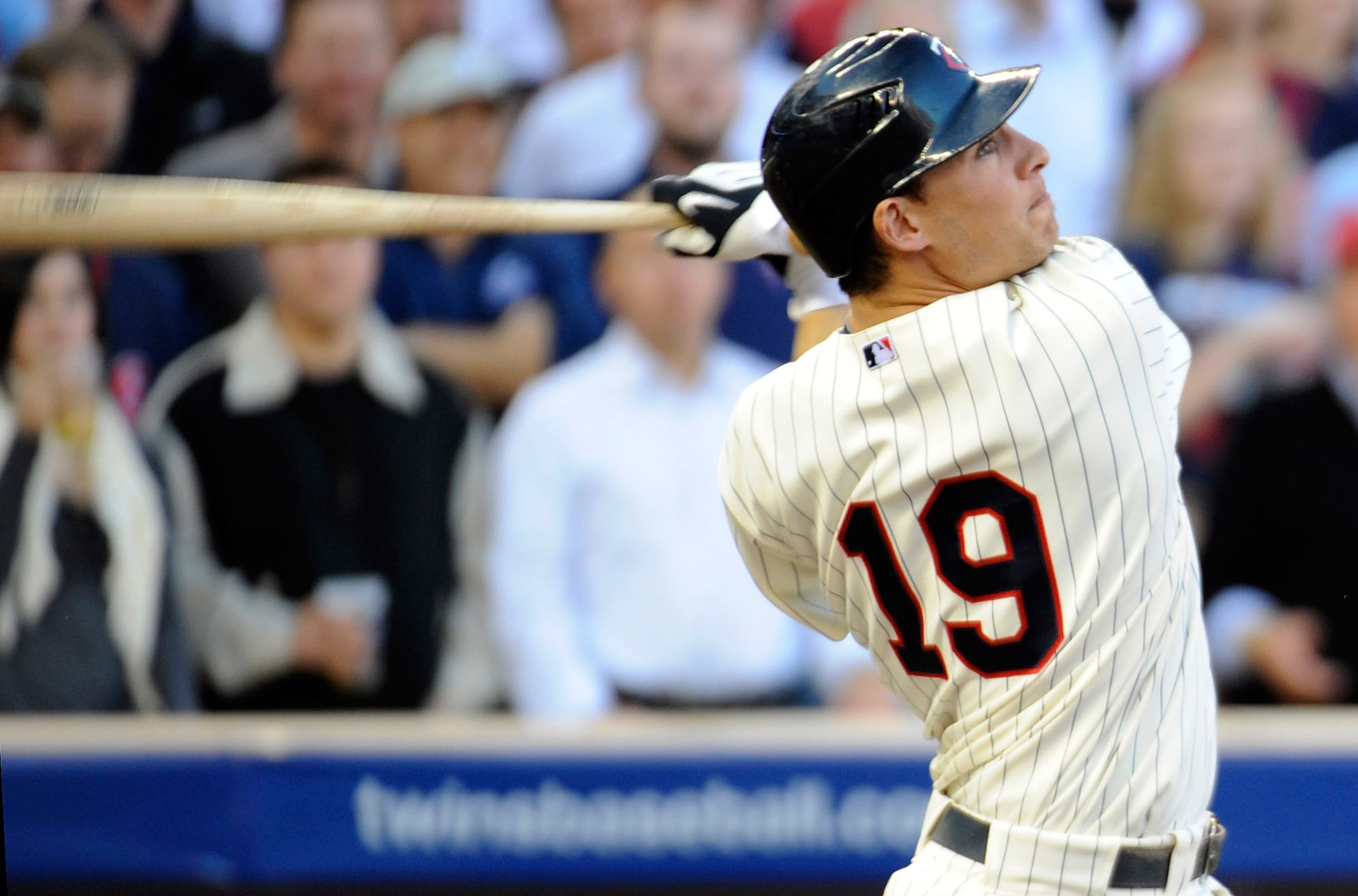 MINNEAPOLIS, MN - OCTOBER 7: Danny Valencia #19 of the Minnesota Twins hits an RBI sacrifice fly in the second inning during game two of the ALDS game against the New York Yankees on October 7, 2010 at Target Field in Minneapolis, Minnesota.  (Photo by Ha