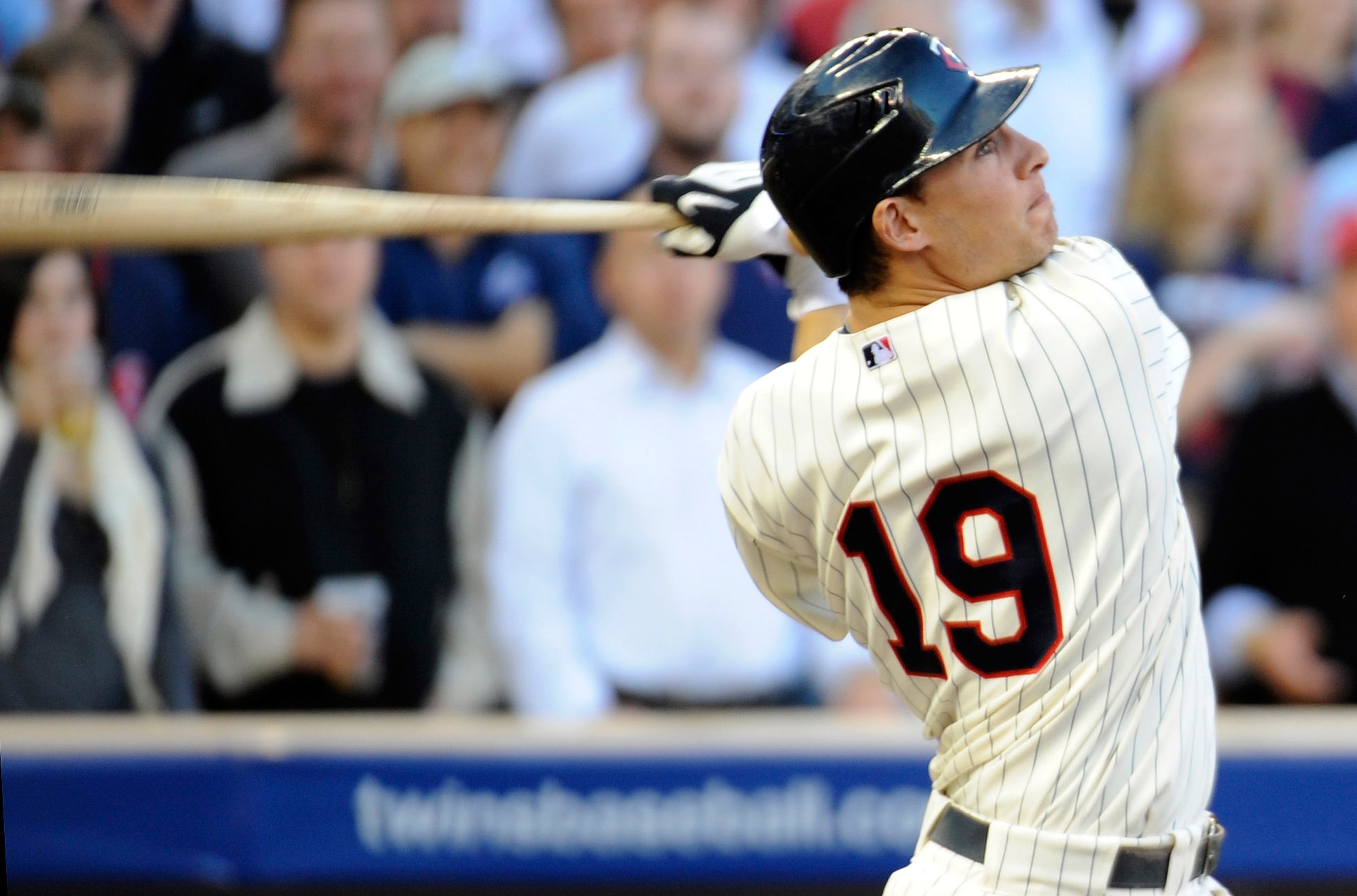 MINNEAPOLIS, MN - OCTOBER 7: Danny Valencia #19 of the Minnesota Twins hits an RBI sacrifice fly in the second inning during game two of the ALDS game against the New York Yankees on October 7, 2010 at Target Field in Minneapolis, Minnesota. (Photo by Ha MINNEAPOLIS, MN - OCTOBER 7: Danny Valencia #19 of the Minnesota Twins hits an RBI sacrifice fly in the second inning during game two of the ALDS game against the New York Yankees on October 7, 2010 at Target Field in Minneapolis, Minnesota. (Photo by Ha