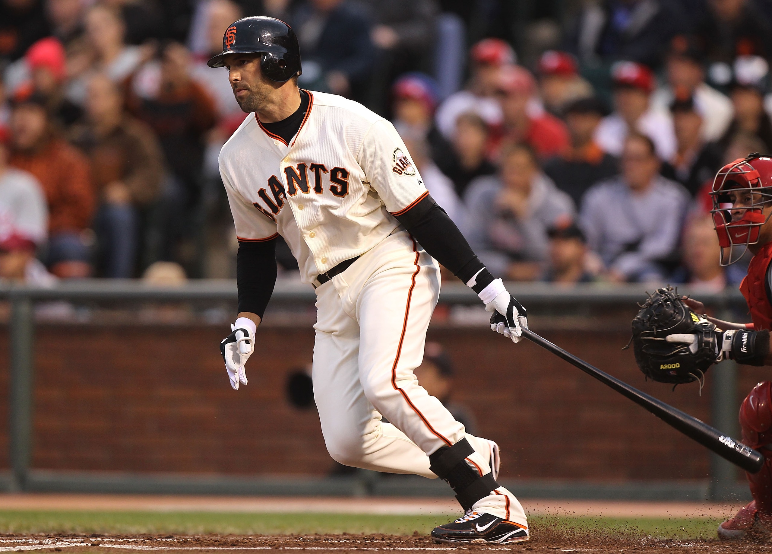 SAN FRANCISCO - APRIL 26:  Mark DeRosa #7 of the San Francisco Giants hits a two run single against the Philadelphia Phillies in the first inning during an MLB game at AT&T Park on April 26, 2010 in San Francisco, California. (Photo by Jed Jacobsohn/Getty