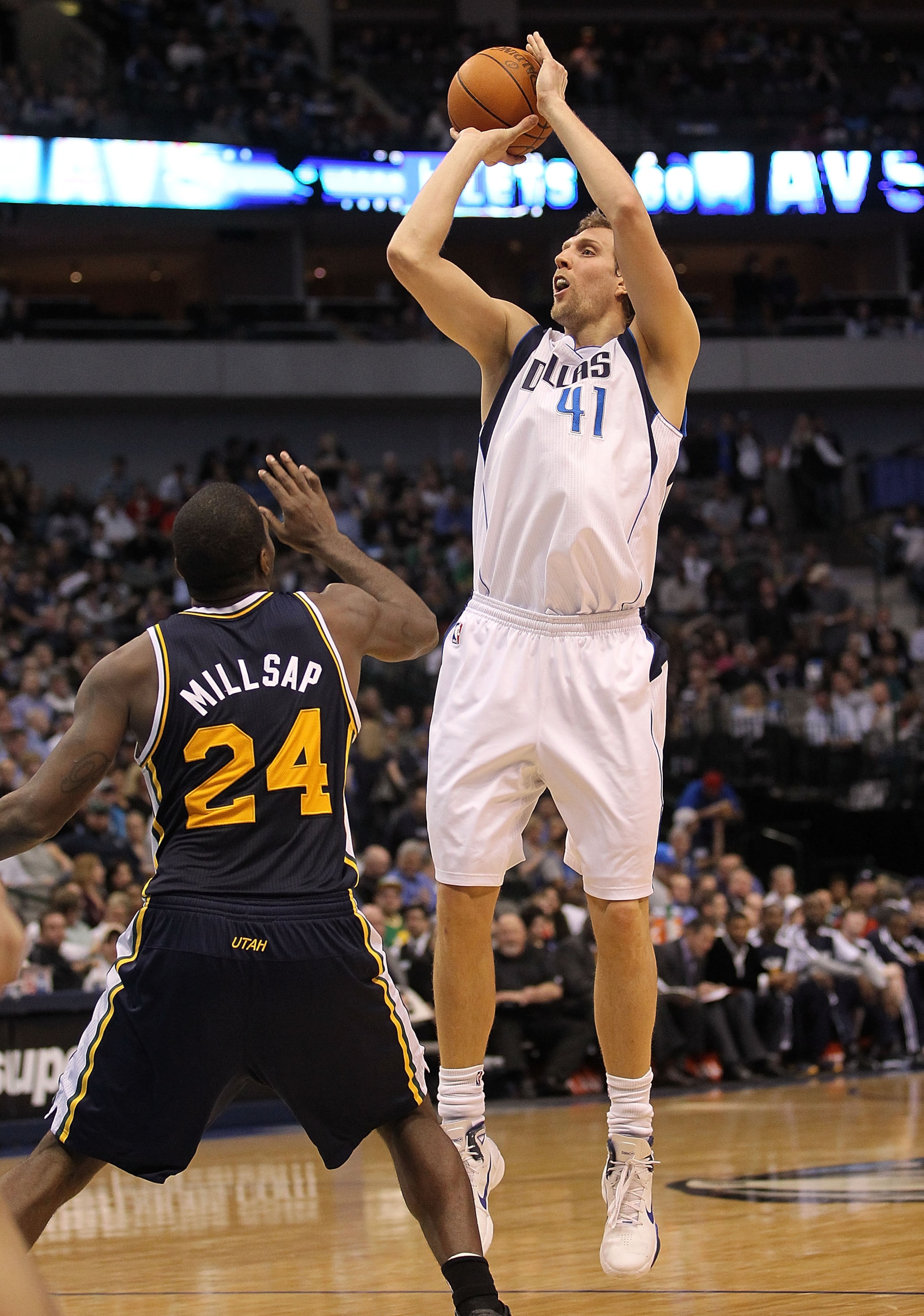 DALLAS, TX - FEBRUARY 23:  Forward Dirk Nowitzki #41 of the Dallas Mavericks takes a shot against Paul Millsap #24 of the Utah Jazz at American Airlines Center on February 23, 2011 in Dallas, Texas.  NOTE TO USER: User expressly acknowledges and agrees th