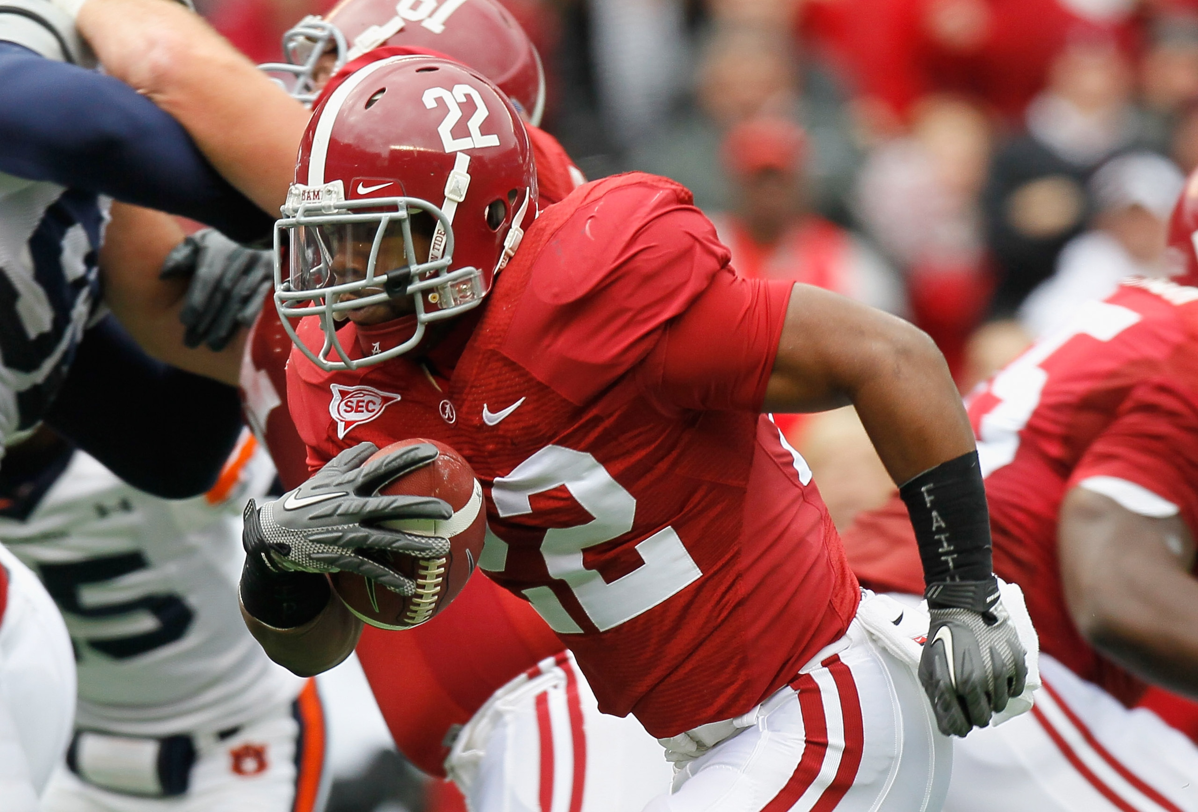 TUSCALOOSA, AL - NOVEMBER 26: Mark Ingram #22 of the Alabama Crimson Tide rushes for a touchdown against the Auburn Tigers at Bryant-Denny Stadium on November 26, 2010 in Tuscaloosa, Alabama. (Photo by Kevin C. Cox/Getty Images) TUSCALOOSA, AL - NOVEMBER 26: Mark Ingram #22 of the Alabama Crimson Tide rushes for a touchdown against the Auburn Tigers at Bryant-Denny Stadium on November 26, 2010 in Tuscaloosa, Alabama. (Photo by Kevin C. Cox/Getty Images)