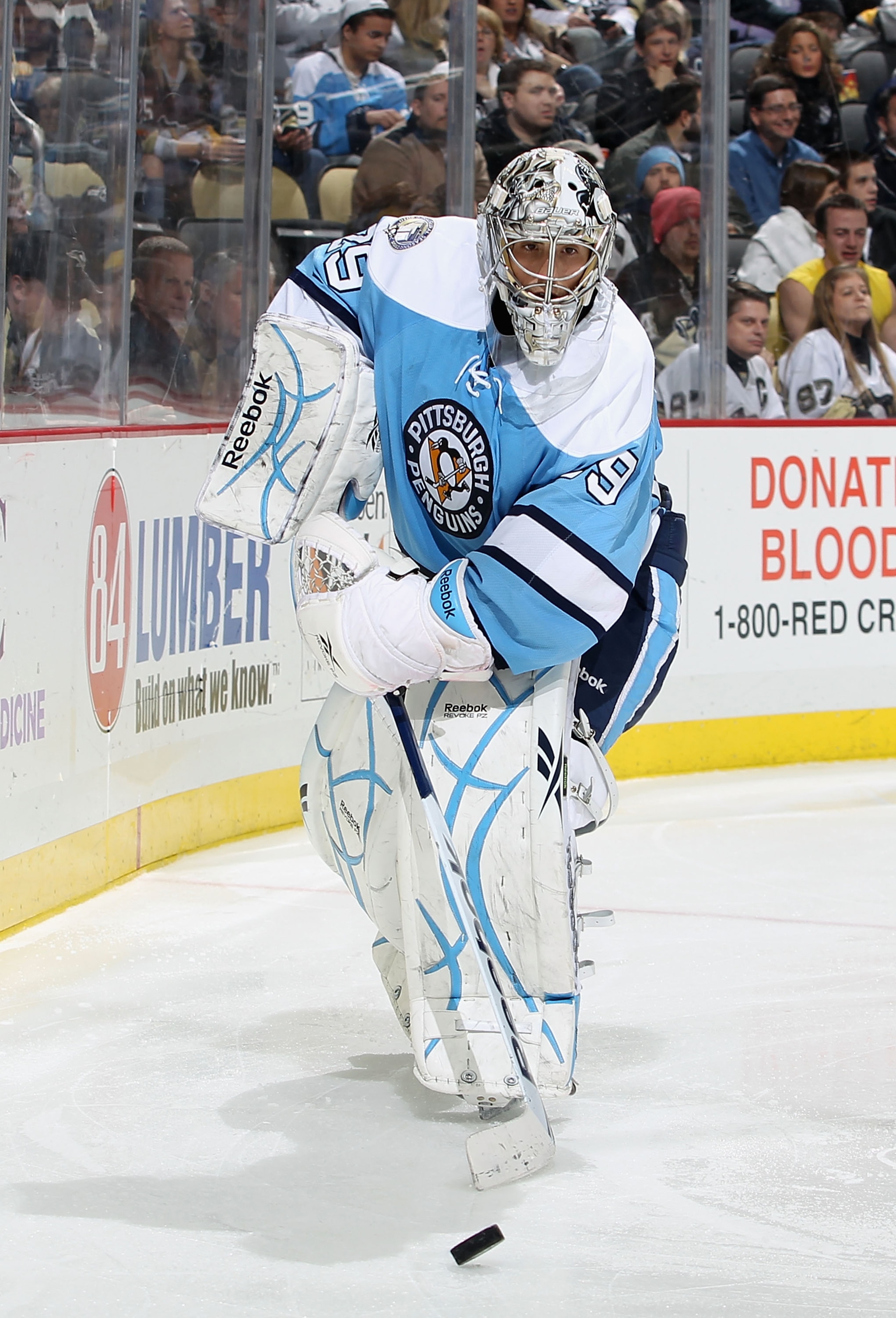PITTSBURGH, PA - FEBRUARY 23:  Goaltender Marc-Andre Fleury #29 of the Pittsburgh Penguins handles the puck during the NHL game against the San Jose Sharks at Consol Energy Center on February 23, 2011 in Pittsburgh, Pennsylvania. The Sharks defeated the P