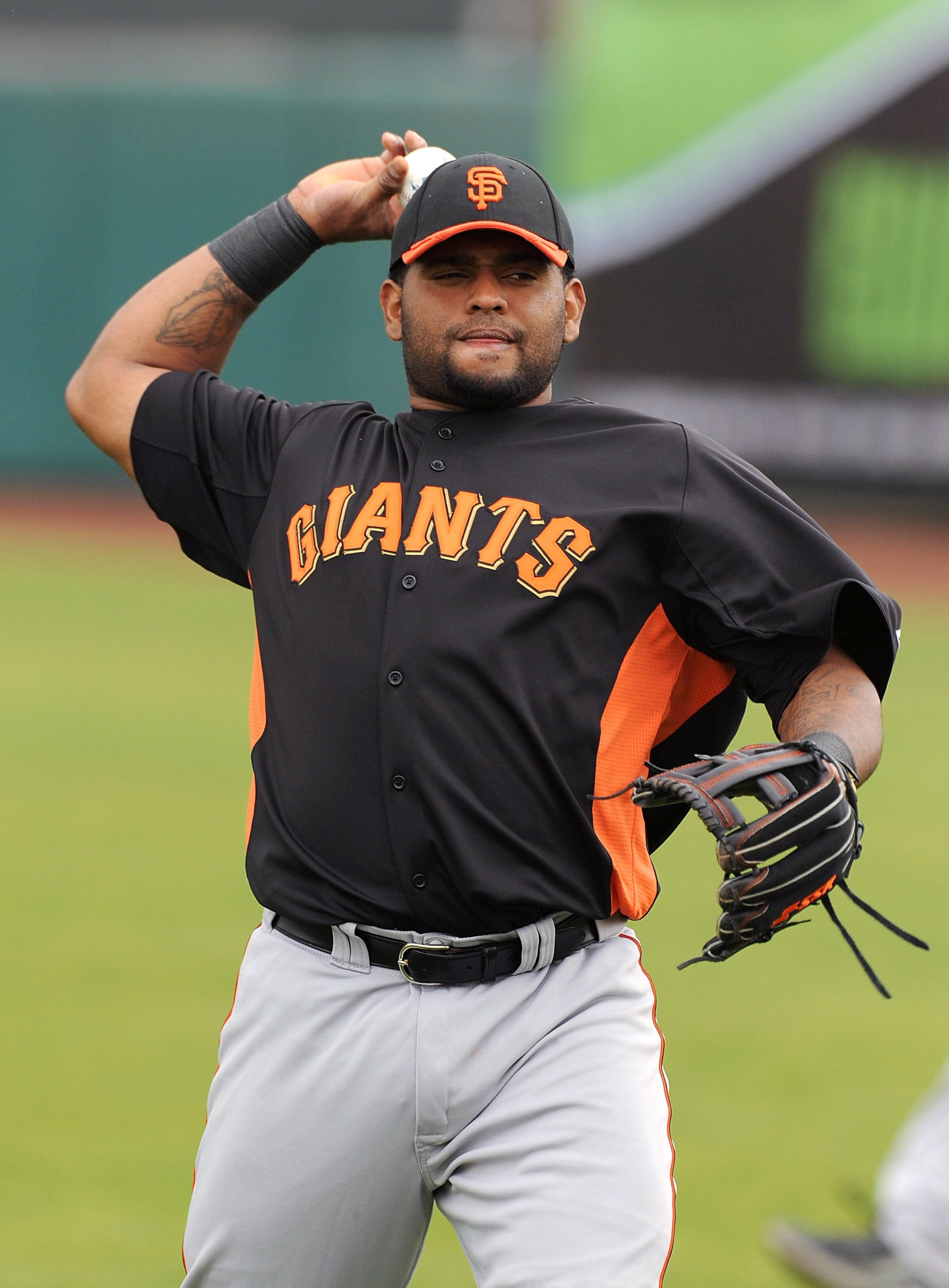 SCOTTSDALE, AZ - FEBRUARY 19:  Pablo Sandoval #48 of the San Francisco Giants warms up prior to taking infield practice at Scottsdale Stadium on February 19, 2011 in Scottsdale, Arizona.  (Photo by Norm Hall/Getty Images)