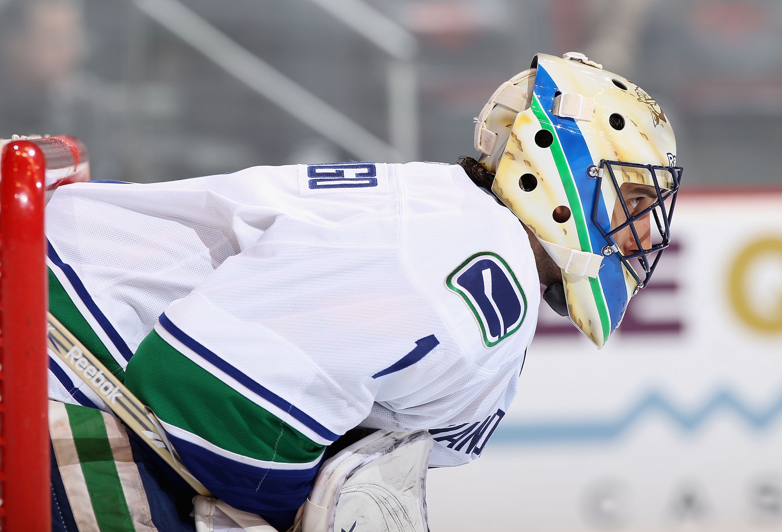 GLENDALE, AZ - FEBRUARY 02:  Goaltender Roberto Luongo #1 of the Vancouver Canucks in action during the NHL game against the Phoenix Coyotes at Jobing.com Arena on February 2, 2011 in Glendale, Arizona.  The Canucks defeated the Coyotes 6-0.  (Photo by Ch
