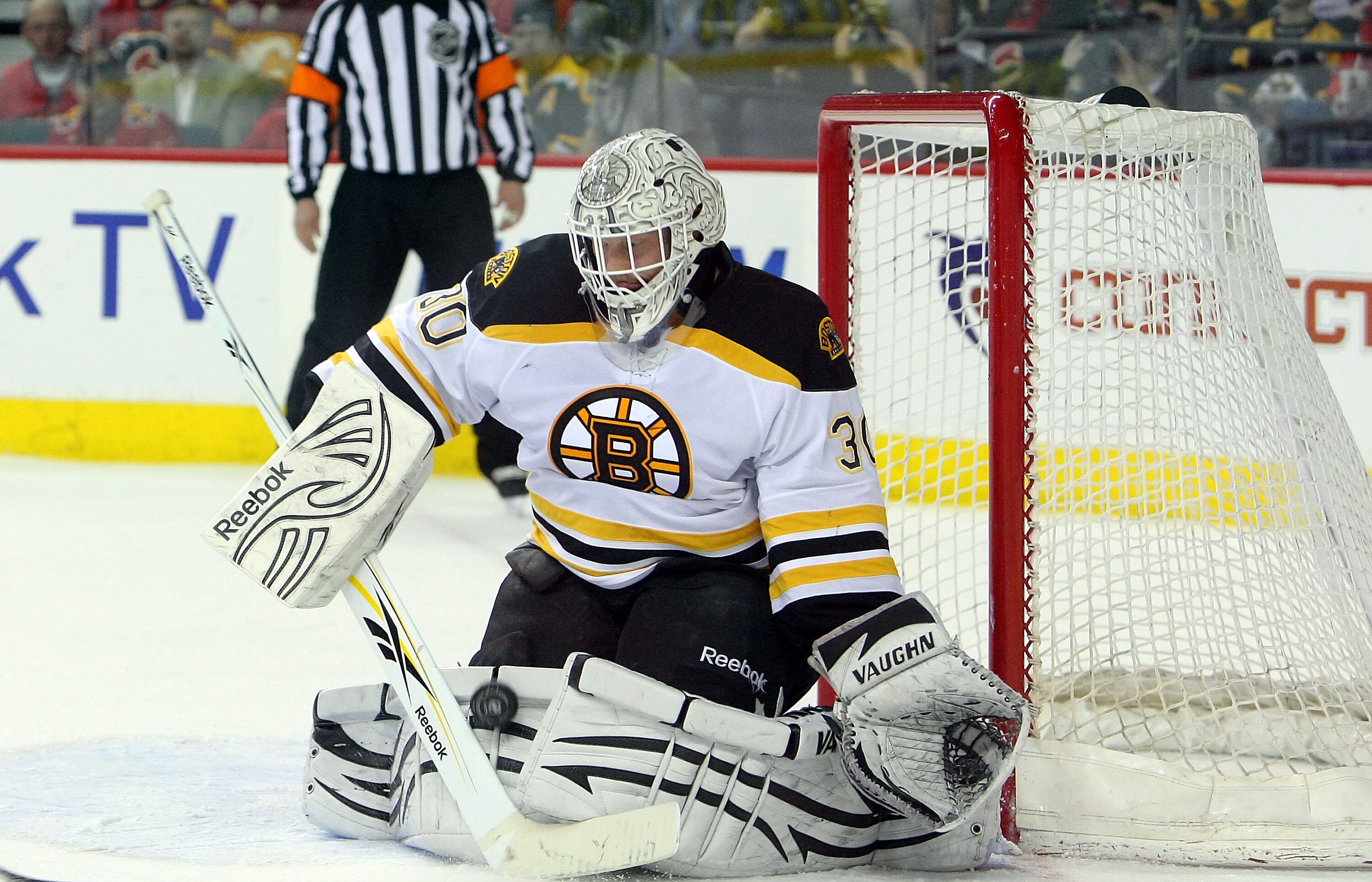 CALGARY,CANADA - FEBRUARY 22: Tim Thomas #30 of the Boston Bruins makes a save against the Calgary Flames their NHL game at Scotiabank Saddledome, February 22,2011 in Calgary, Alberta, Canada.(Photo By Dave Sandford/Getty Images) CALGARY,CANADA - FEBRUARY 22: Tim Thomas #30 of the Boston Bruins makes a save against the Calgary Flames their NHL game at Scotiabank Saddledome, February 22,2011 in Calgary, Alberta, Canada.(Photo By Dave Sandford/Getty Images)