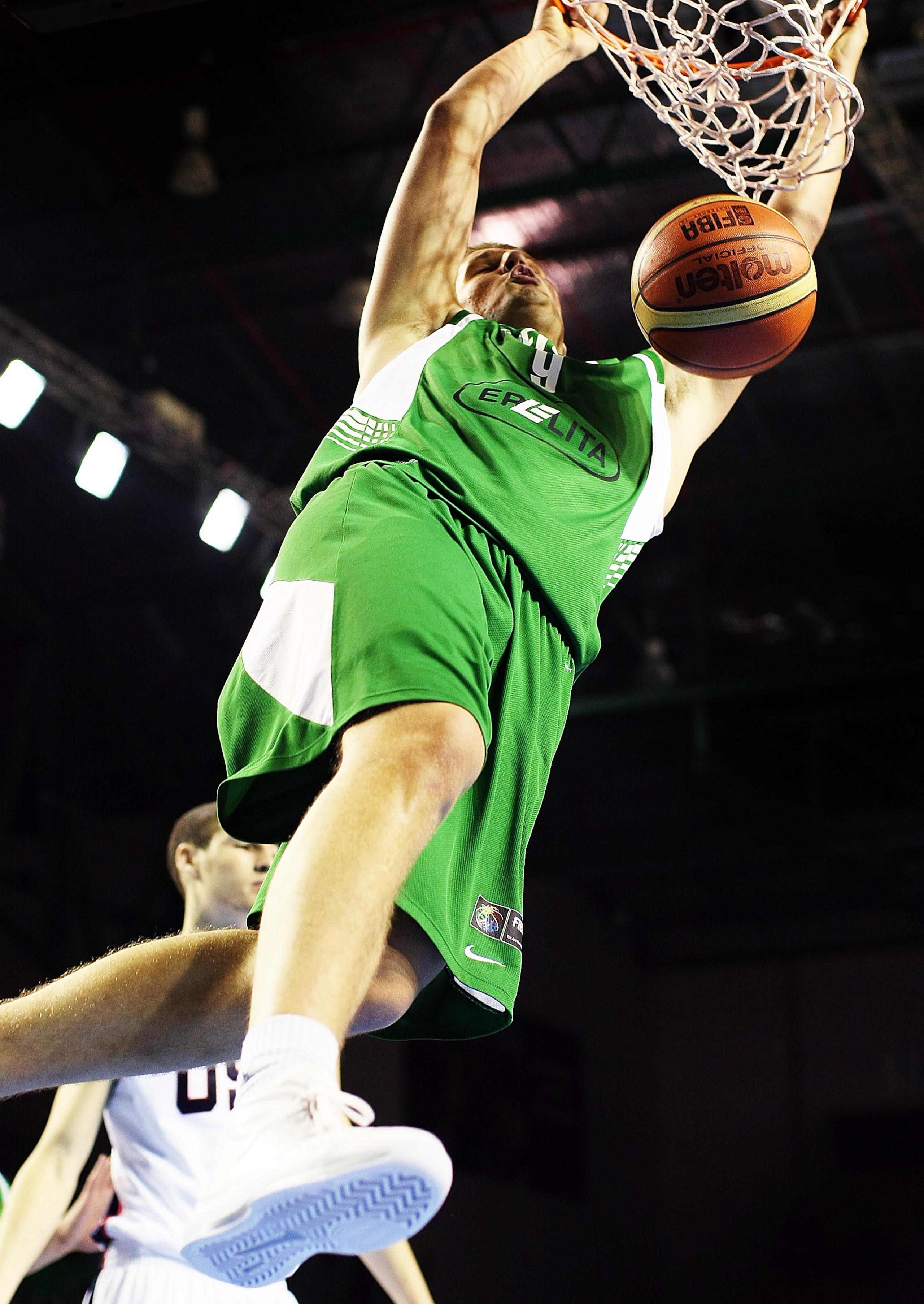 AUCKLAND, NEW ZEALAND - JULY 08: Tautvydas Slezas of Lithuania dunks the ball during the U19 Basketball World Championships match between the United States and Lithuania at North Shore Events Centre on July 8, 2009 in Auckland, New Zealand. (Photo by Ha AUCKLAND, NEW ZEALAND - JULY 08: Tautvydas Slezas of Lithuania dunks the ball during the U19 Basketball World Championships match between the United States and Lithuania at North Shore Events Centre on July 8, 2009 in Auckland, New Zealand. (Photo by Ha