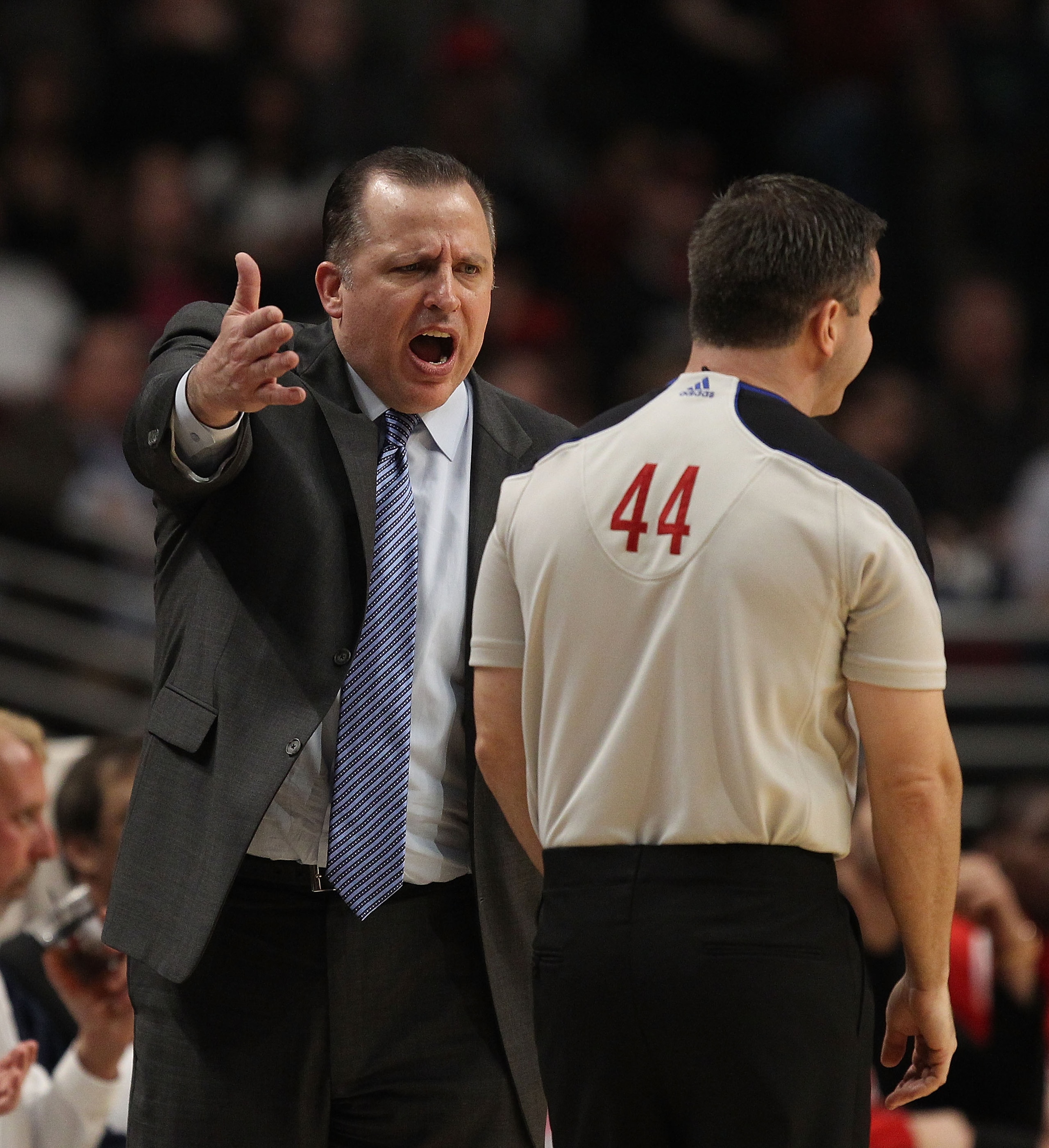 CHICAGO, IL - FEBRUARY 17: Head coach Tom Thibodeau of the Chicago Bulls argues a call with referee Eli Roe #44 during a game against the San Antonio Spurs at the United Center on February 17, 2011 in Chicago, Illinois. The Bulls defeated the Spurs 109-99