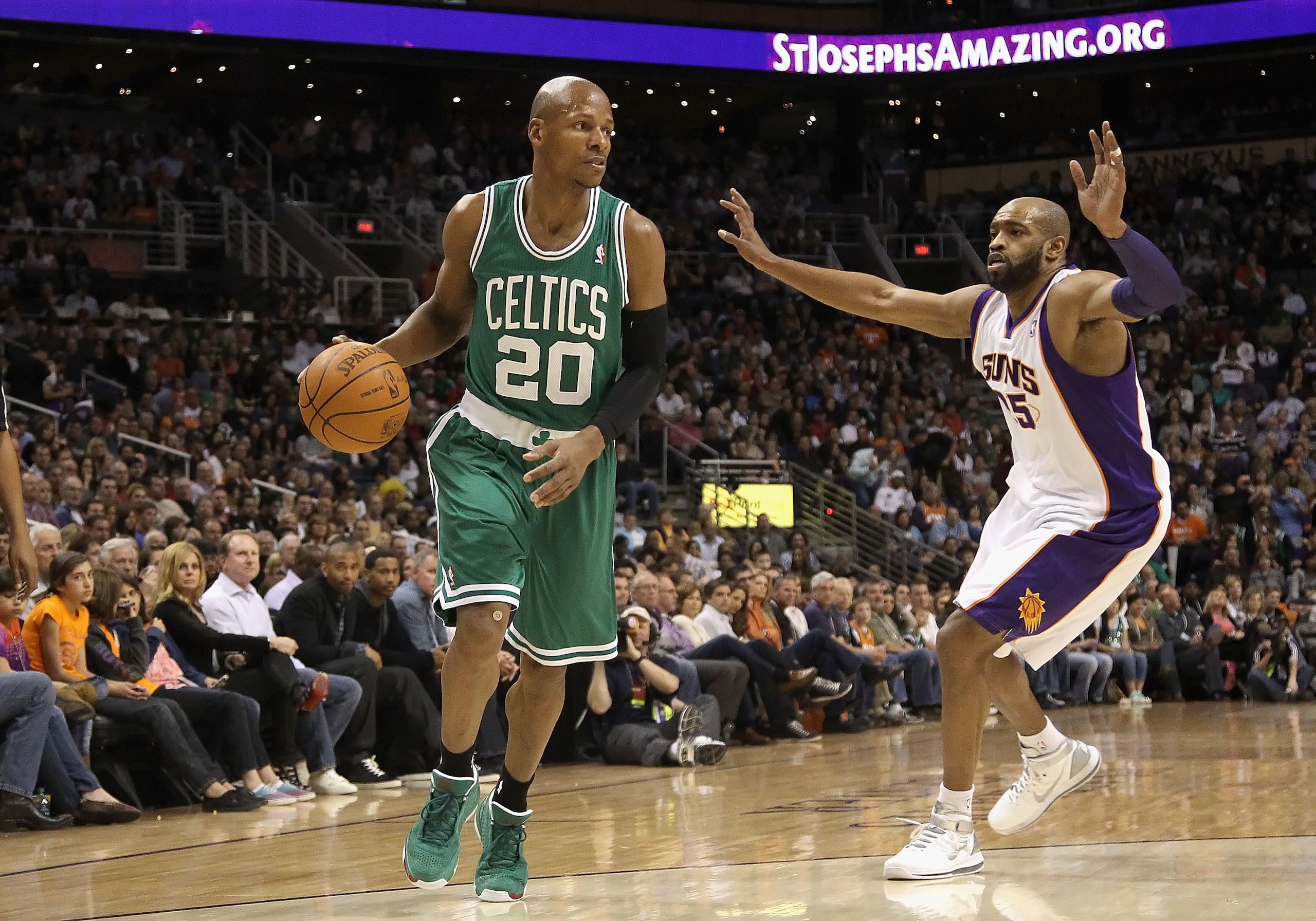PHOENIX, AZ - JANUARY 28:  Ray Allen #20 of the Boston Celtics handles the ball during the NBA game against the Phoenix Suns at US Airways Center on January 28, 2011 in Phoenix, Arizona. The Suns defeated the Celtics 88-71. NOTE TO USER: User expressly ac