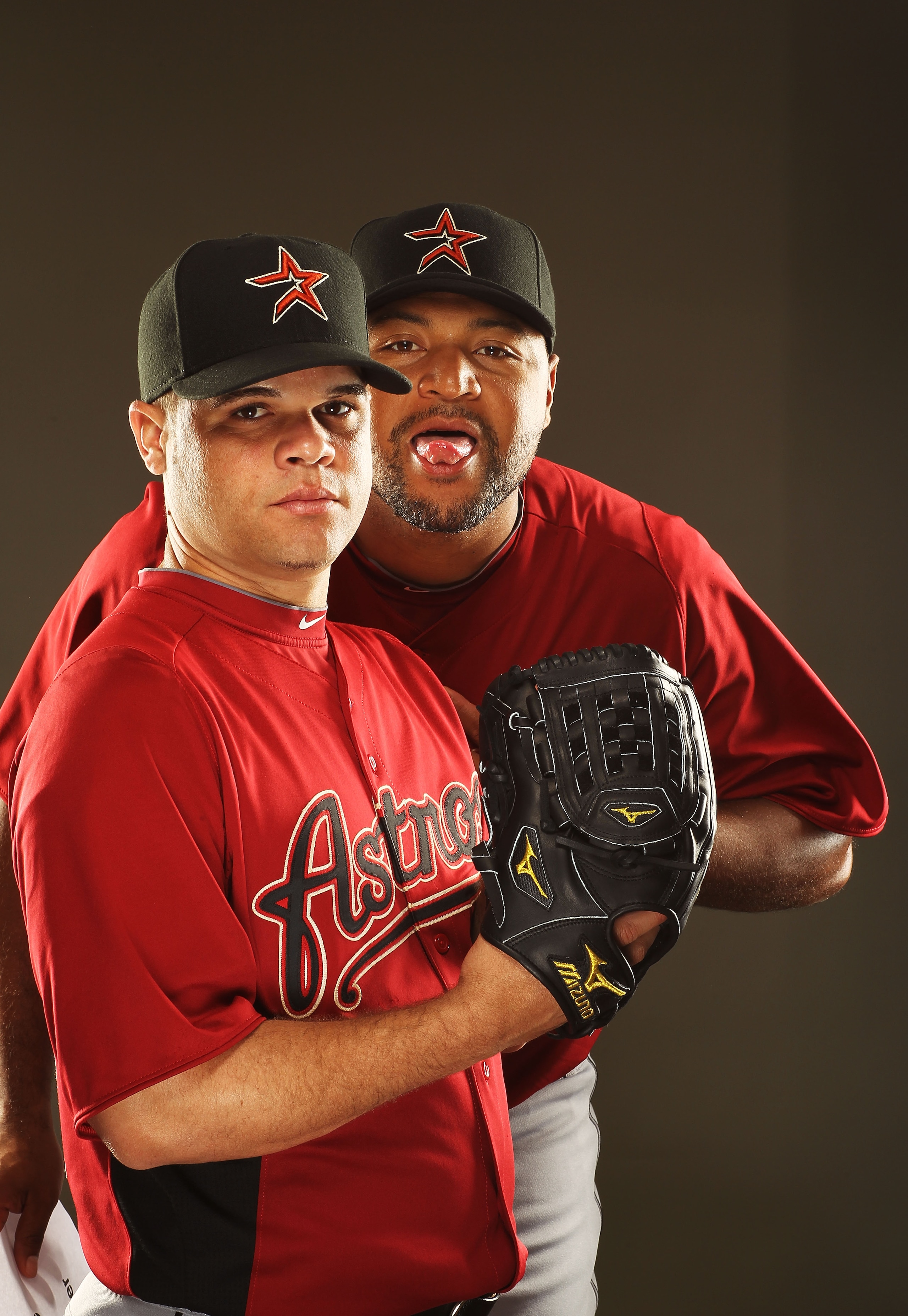 KISSIMMEE, FL - FEBRUARY 24:  Wandy Rodriguez #51 and Carlos Lee #45 of the Houston Astros pose for a portrait Spring Training photo Day at Osceola County Stadium  on February 24, 2011 in Kissimmee, Florida.  (Photo by Al Bello/Getty Images)